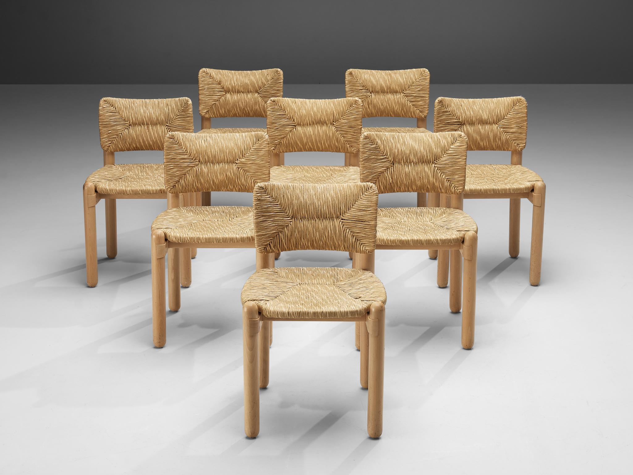 Set of eight dining chairs, beech, straw, Italy, 1970s

This set of eight dining chairs reminds of the designs of Charlotte Perriand. Especially the way how four circular legs are combined with a straw seat and backrest. The bright color of the wood