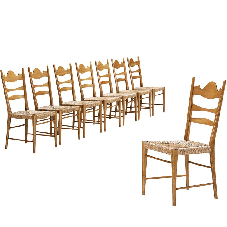 Set of Eight Italian Dining Chairs with Carved Backs and Straw Seats