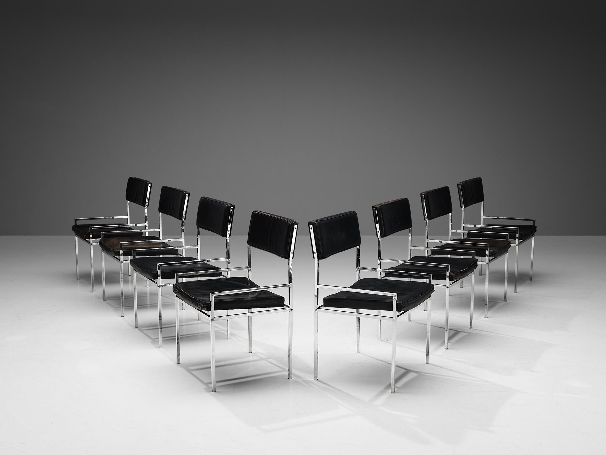 Dining chairs, leather, chrome, Italy, 1970s. 

Postmodern set of eight dining chairs, featuring a sturdy and robust frame of chromed metal. The frame consists of thick square tubes that makes the chairs very stabile. Soft black leather is used for