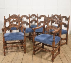 Set of Eight Jacobean Revival Carved Oak Dining Chairs