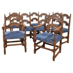 Set of Eight Jacobean Revival Carved Oak Dining Chairs