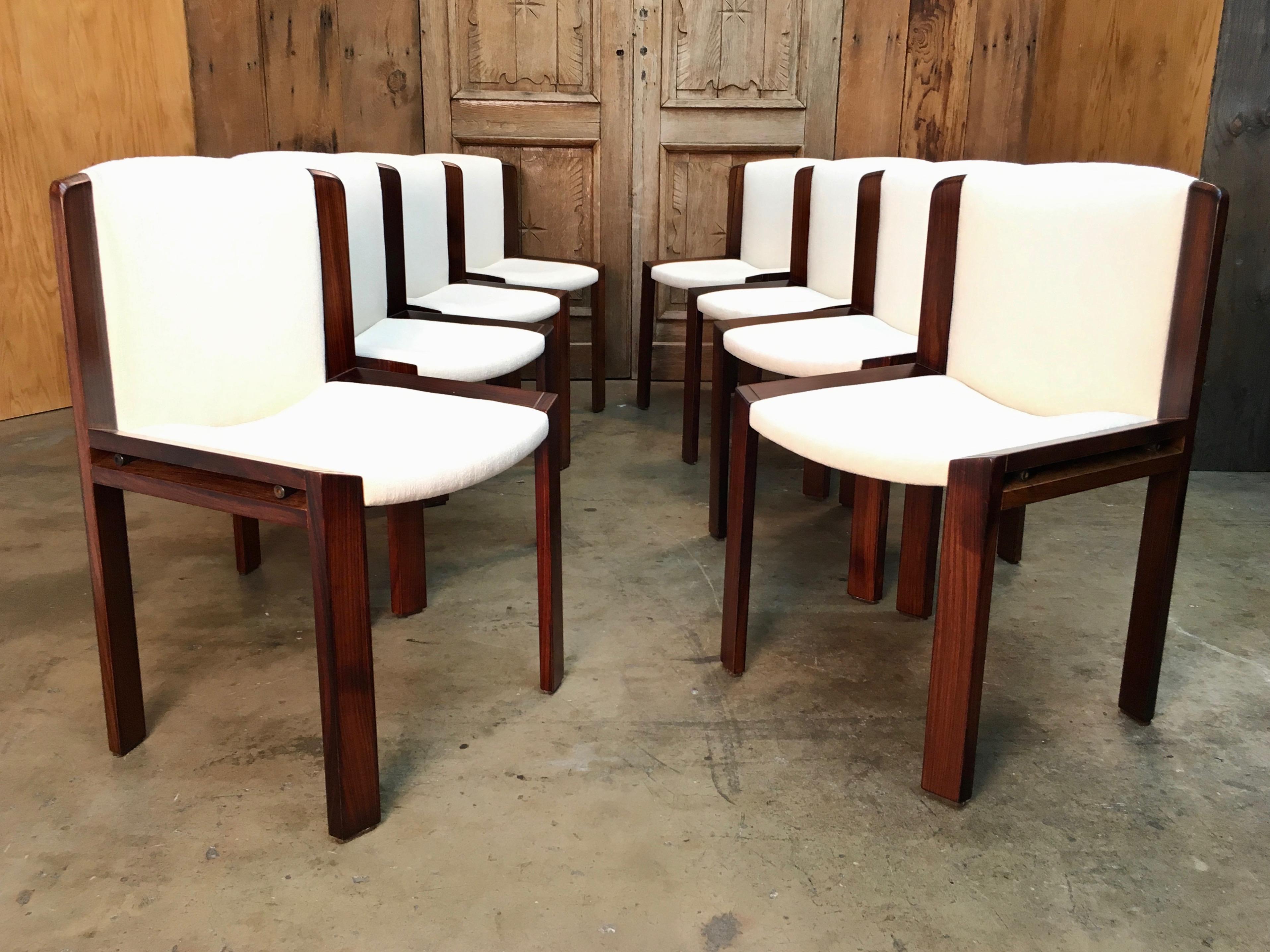 Italian design by Joe Colombo 1960s lightly refinished with new upholstery very rare to have a set of eight.