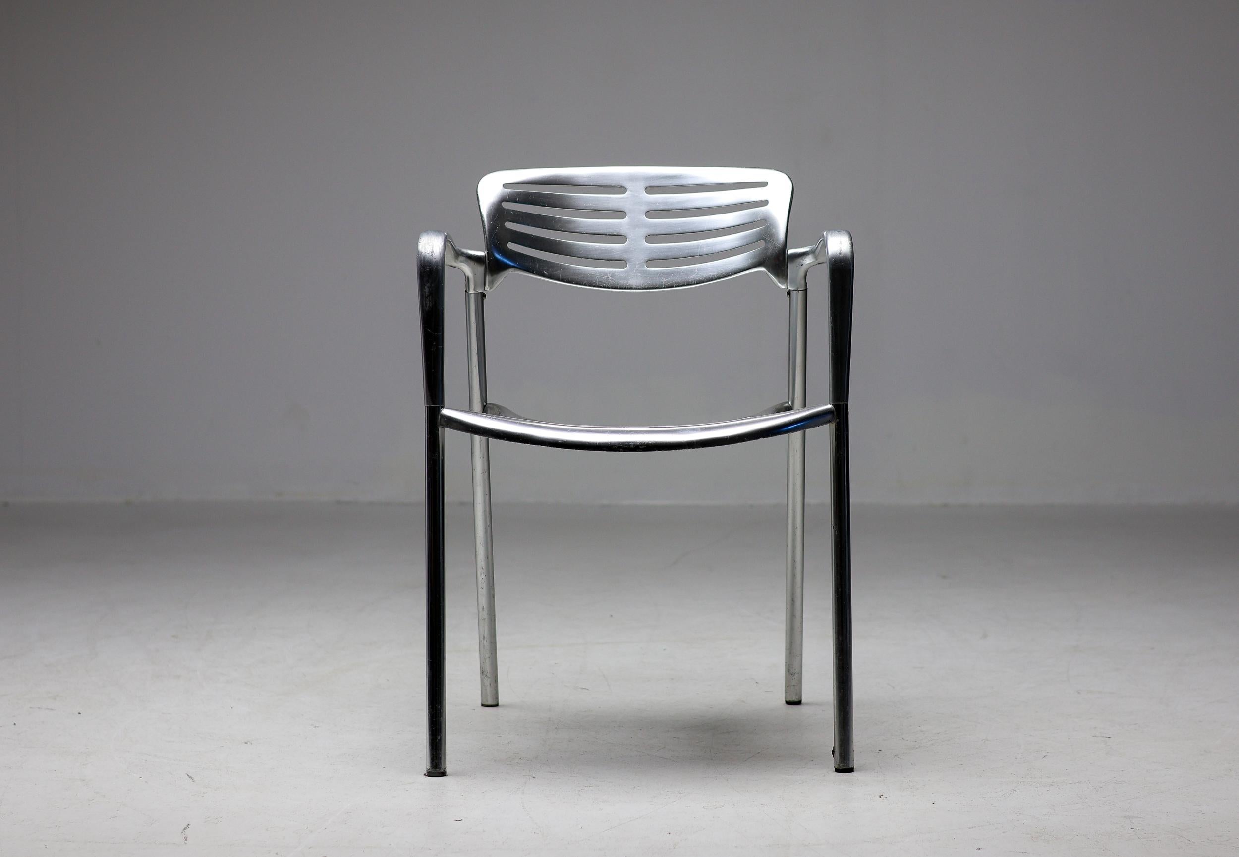 Toledo armchairs designed by Jorge Pensi, aluminum, Spain, 1988.  
Pensi designed the 'Toledo' chairs and the 'Toledo' table for the manufacturer Amat in Spain. Later the designs were adopted by Knoll International. The 'Toledo' chair features a