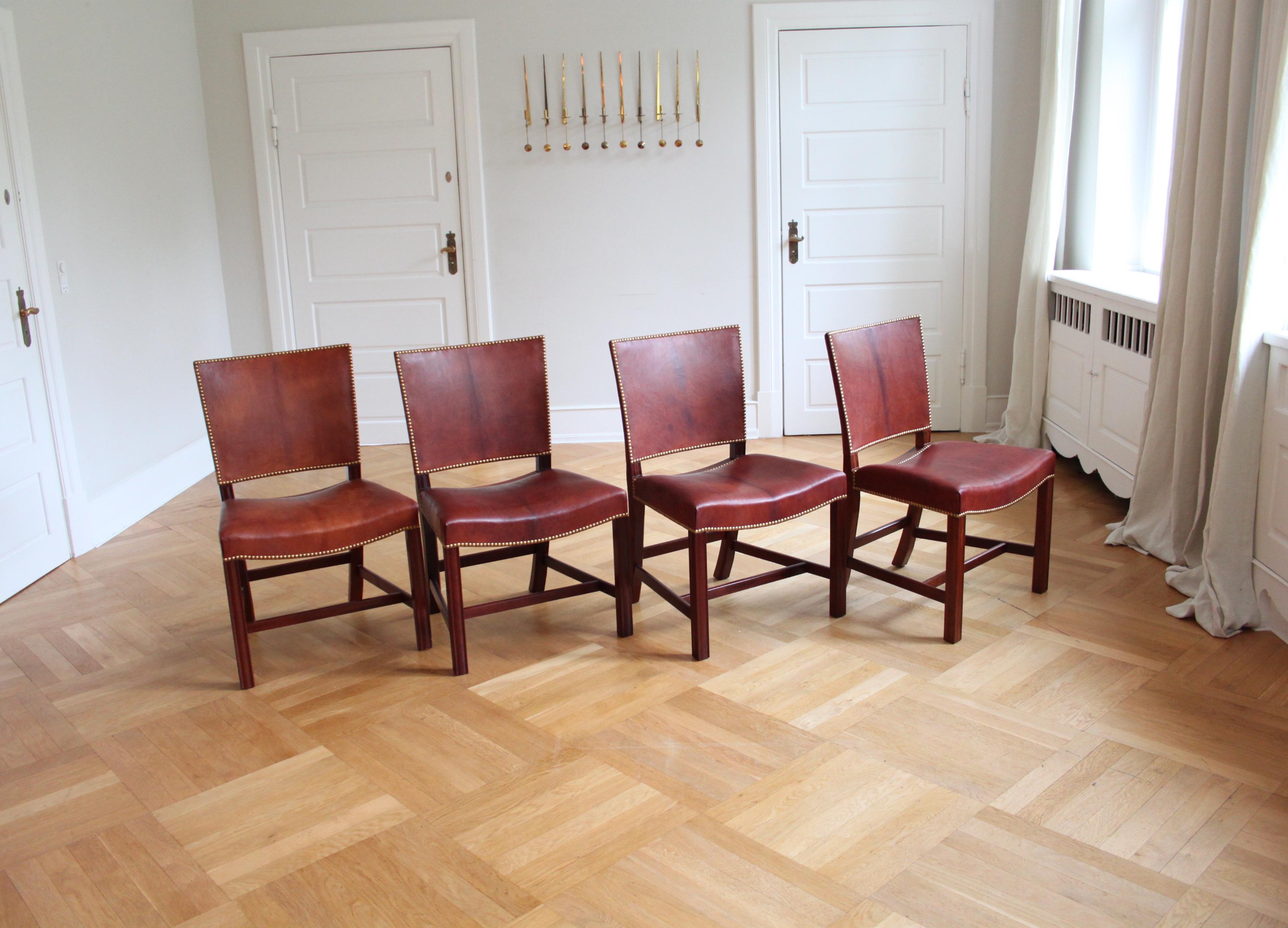 Kaare Klint & Rud Rasmussen Snedkerier - Scandinavian Modern Design.

An extraordinary set of eight Kaare Klint red chairs, executed by cabinetmaker Rud. Rasmussen, Denmark.

Profiled legs of mahogany, seat and back upholstered with Niger leather