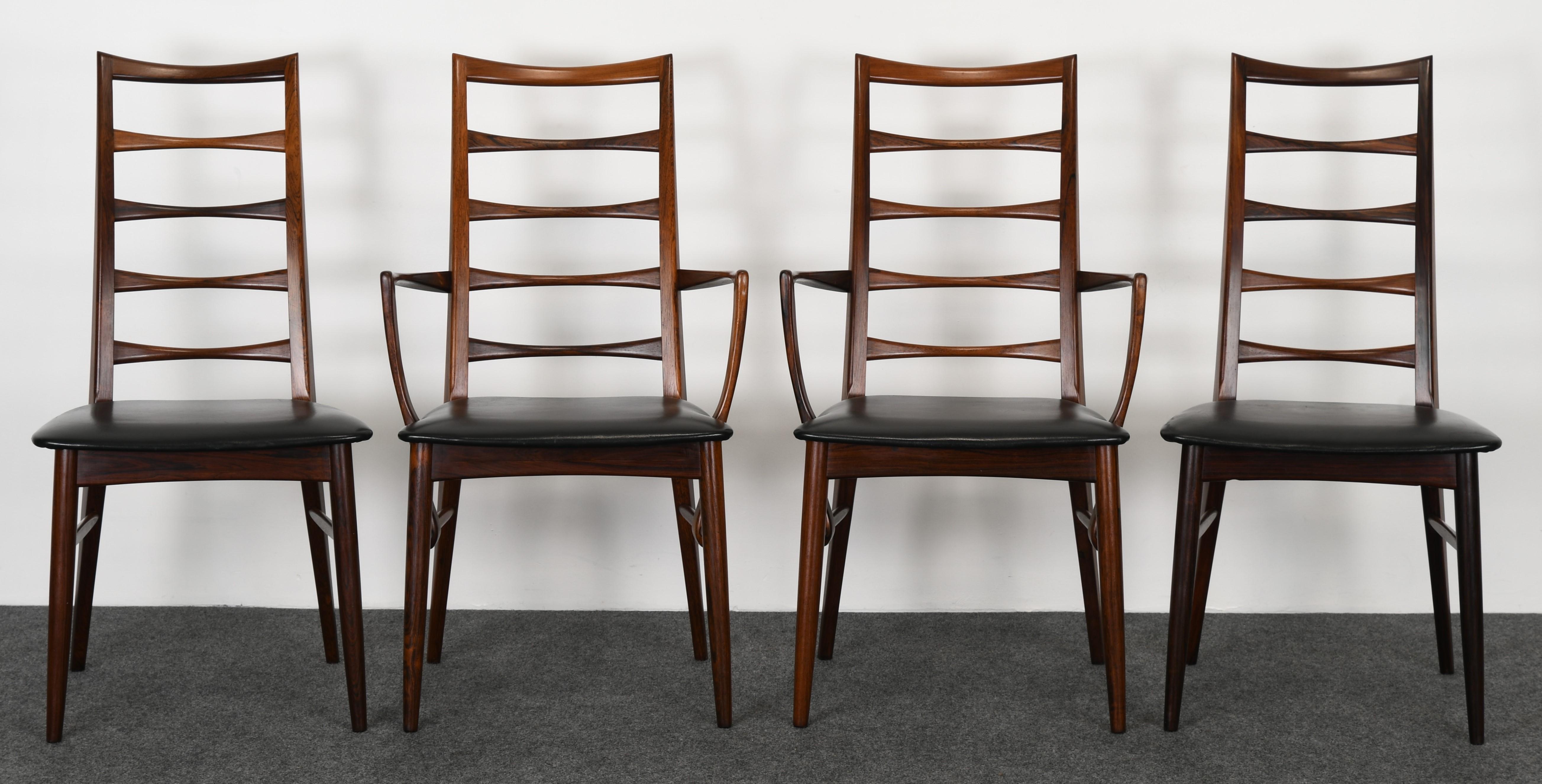 A gorgeous set of eight Koefoeds Hornslet rosewood dining chairs designed by Niels Koefoed, 1950s. This set has six side chairs and two armchairs. The chairs are structurally sound and in very good condition. The six side chairs are covered in faux
