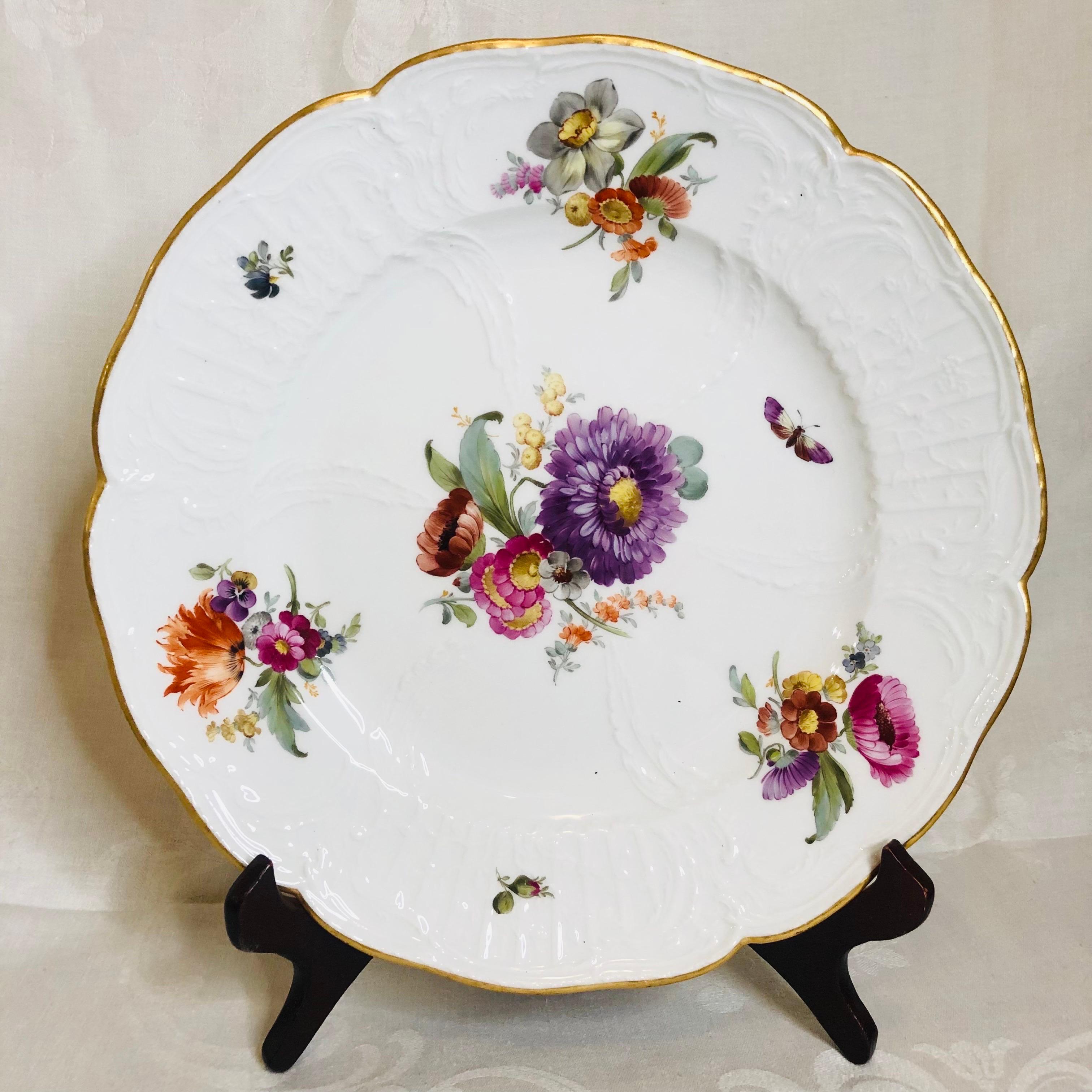 Porcelain Set of Eight KPM Dinner Plates Each Painted with a Different Bouquet of Flowers