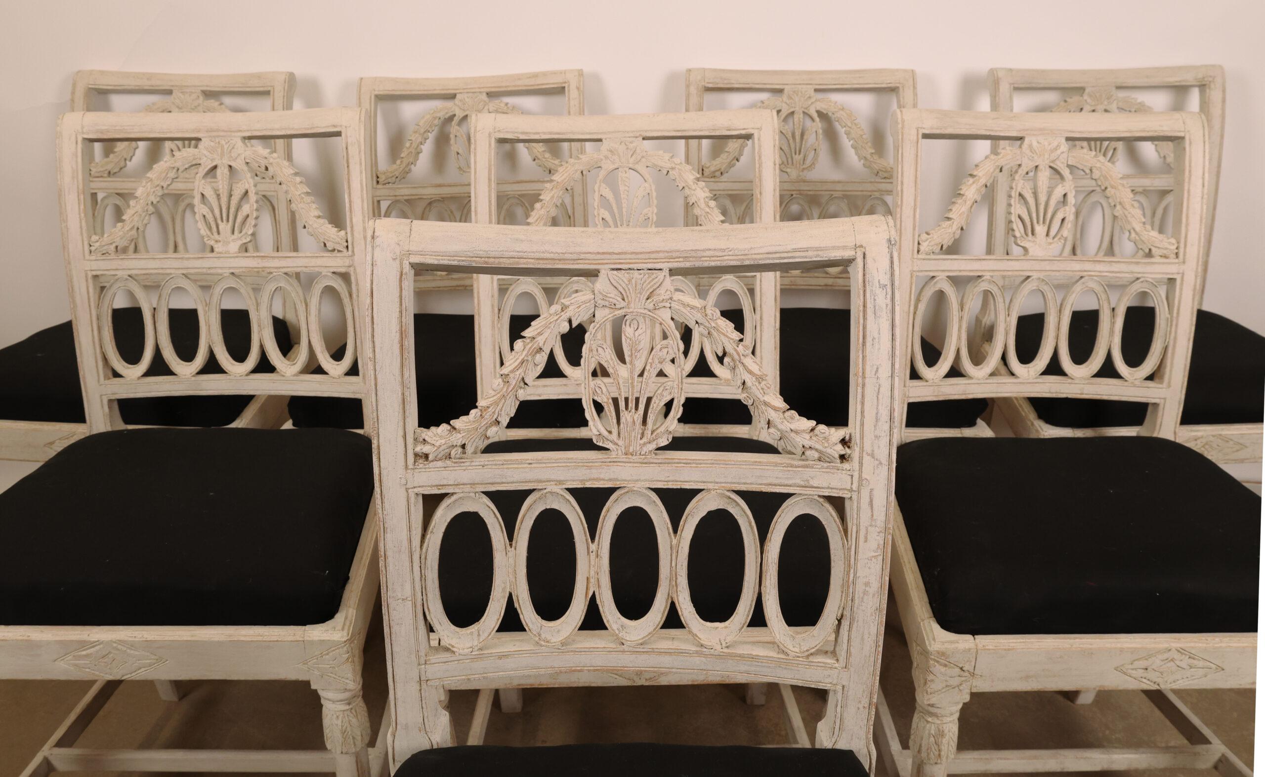 Eight similar late Gustavian chairs, made around 1800 in the village of Lindome, outside Gothenburg in Sweden. The characteristic features of these chairs are the round front legs combined with the backward-curved backrest and rear legs. Also