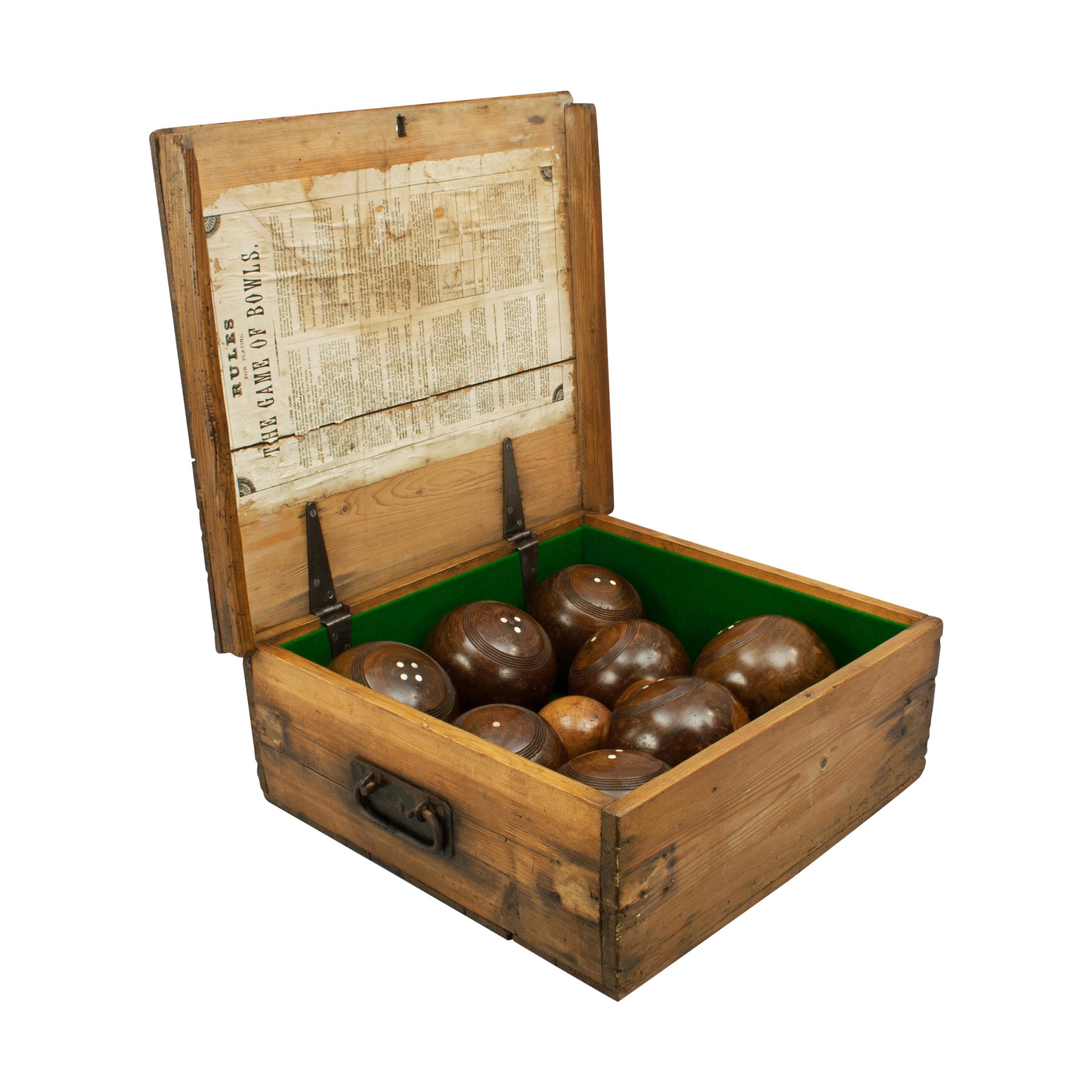 Boxed Lignum vitae lawn bowls.
A good set of 8 lignum vitae lawn bowls in original polished pine box in good condition with a baized interior bottom. The set comes with a lignum-vitae jack (8 cm diameter) and four pairs of bowls, the pairs
