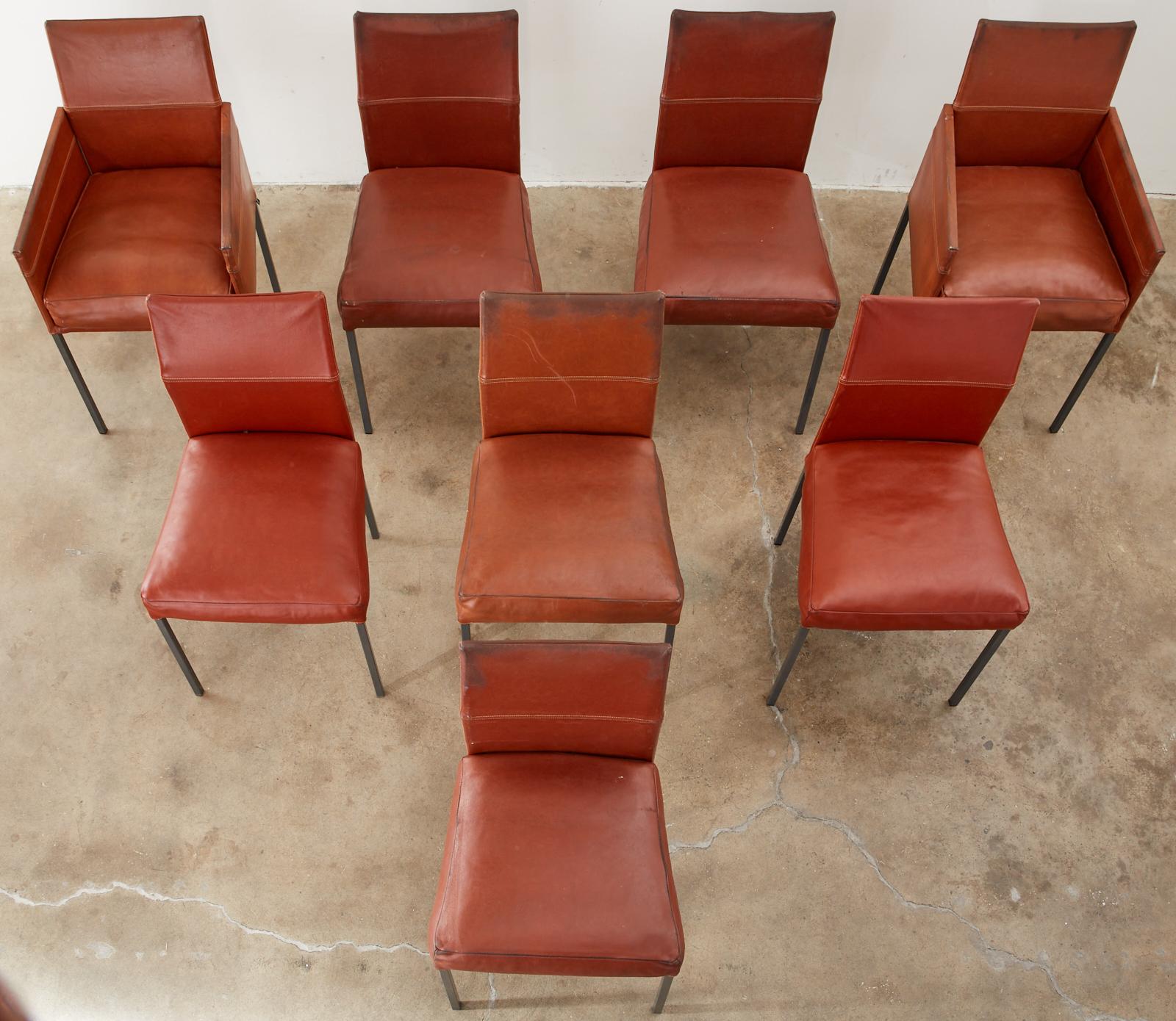 Stylish Postmodern design set of eight German dining chairs by KFF (Karl Friedrich-Forster). The set consists of six side chairs and two armchairs having a 26 inch high arm. Known as the Texas design with an angled back support and soft pillow