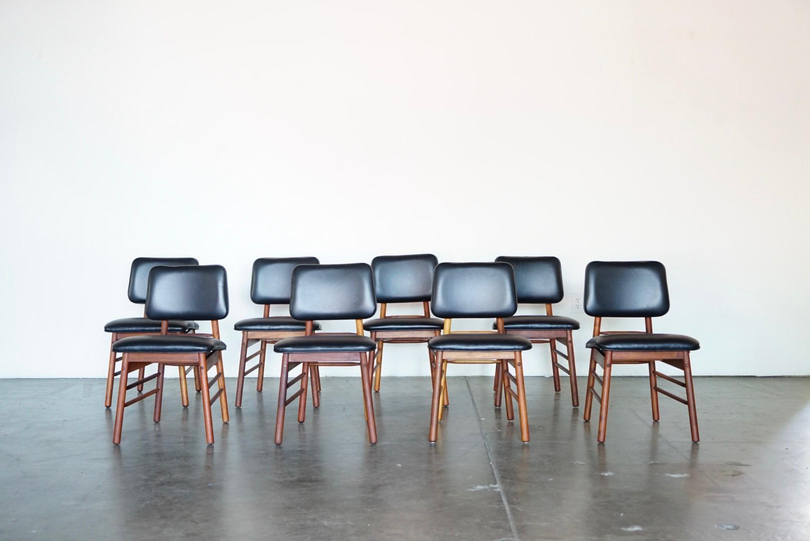 A gorgeous restored set of eight (8) dining chairs by Greta Grossman for Glenn of California. These Model 6260 chairs were designed in 1952 and produced in the early to mid-1950s. We fully restored each chair with high quality luxury black leather