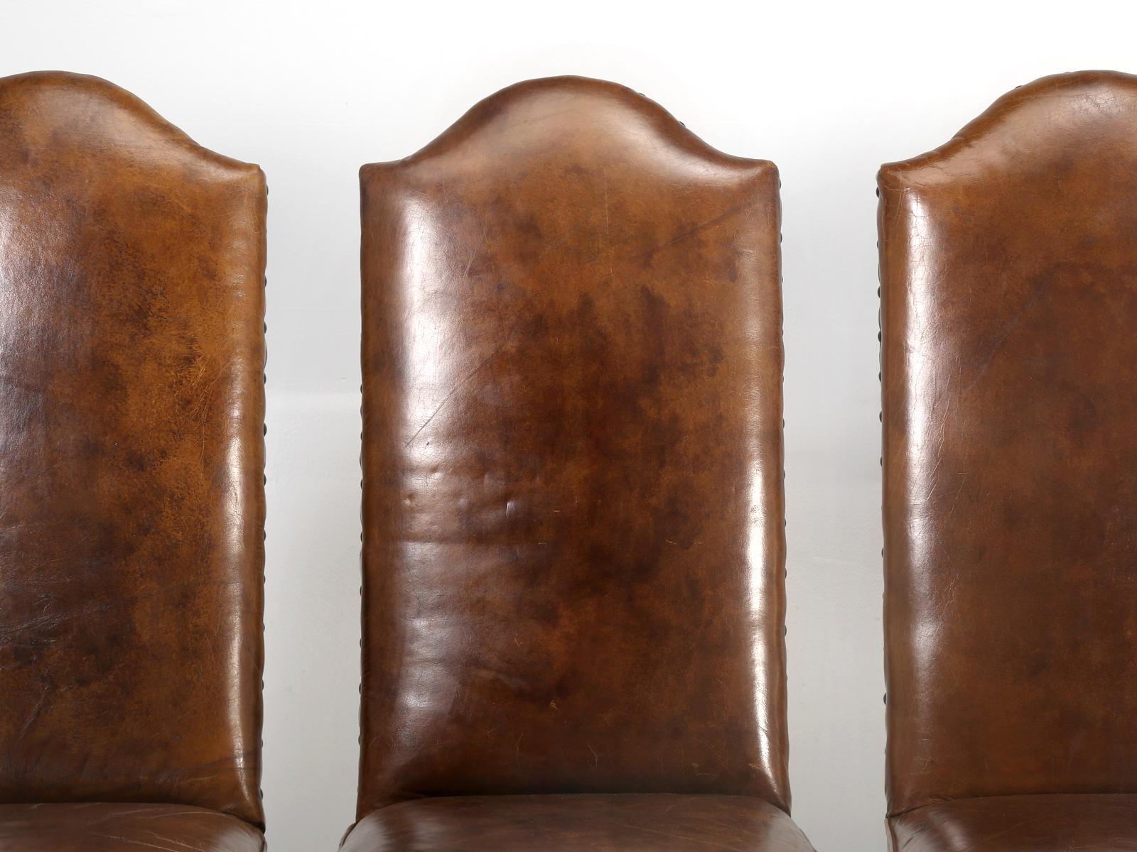 Set of eight, very comfortable leather dining chairs, that we use to import from England, on a regular basis back in the 1990s. These we gently used by a single gentleman, with no children, which is probably why they still look so nice. The leather