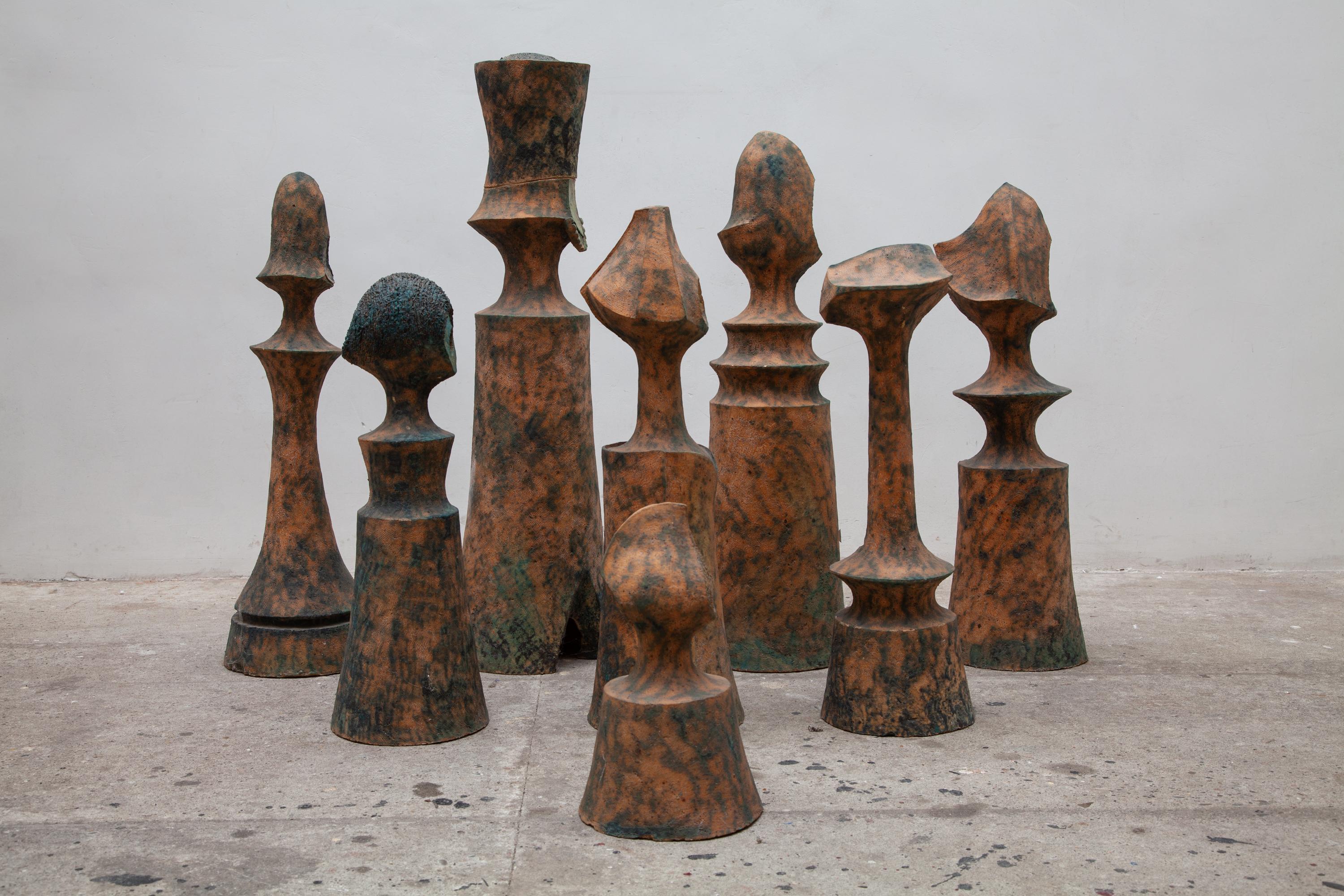 Large set of modern midcentury eight natural clay ceramic chess pieces, decorative figures of the King, the Queen a Rook, the Knight, a Bishop and a Pawn. Every piece is an unique hand-modeled life-size ceramic sculpture designed and executed in an