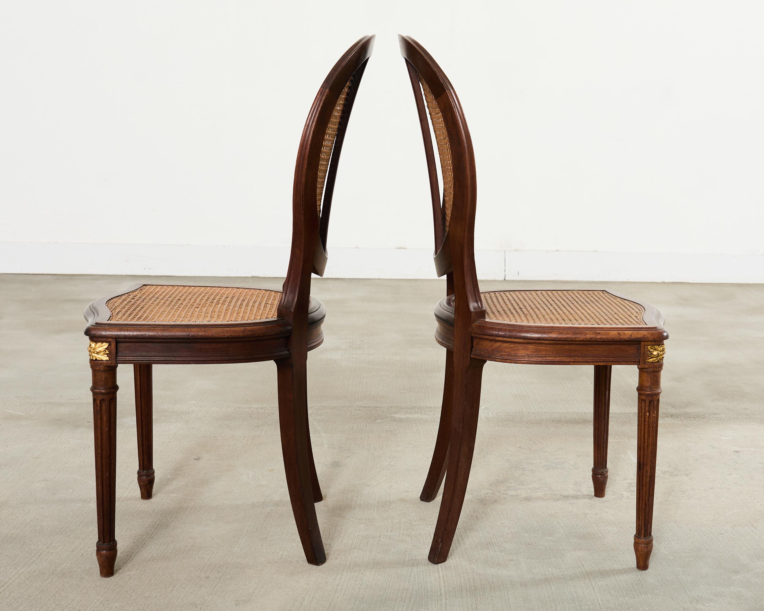 Set of Eight Louis XVI Style Bronze Ormolu Caned Dining Chairs en vente 4