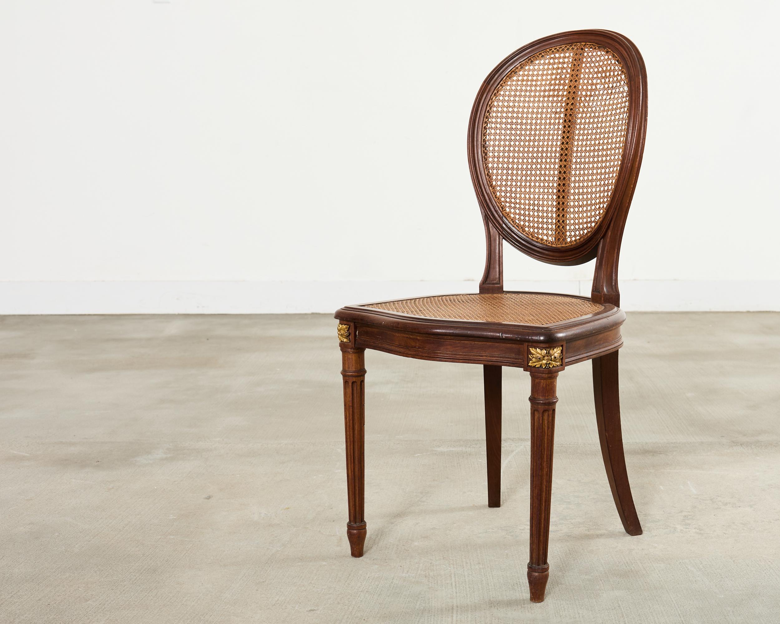 Set of Eight Louis XVI Style Bronze Ormolu Caned Dining Chairs en vente 8