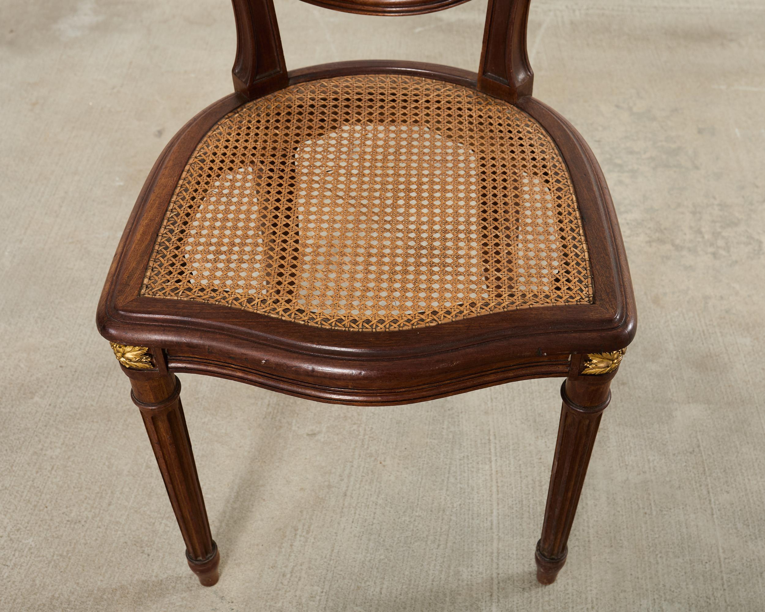 Set of Eight Louis XVI Style Bronze Ormolu Caned Dining Chairs en vente 11