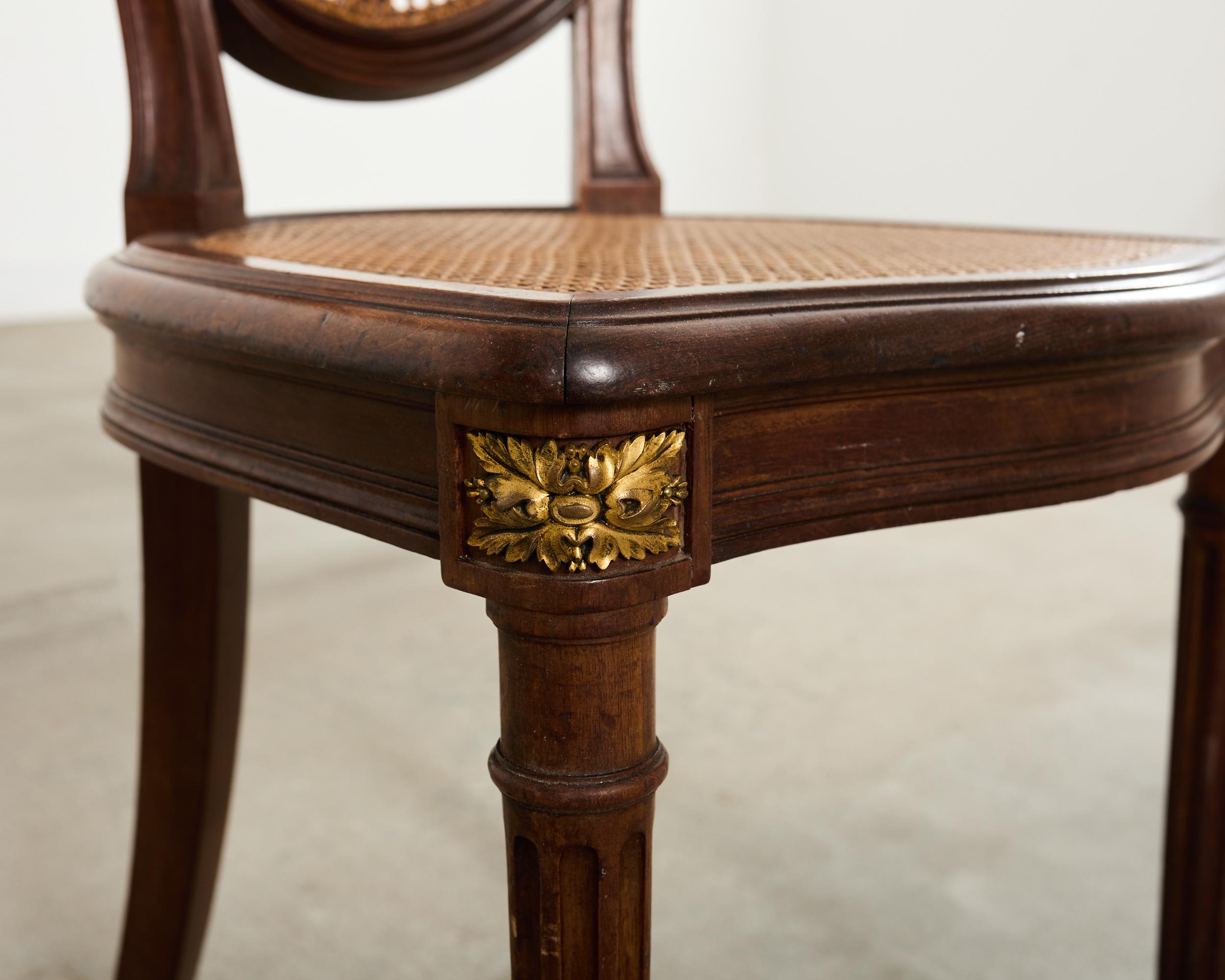 Set of Eight Louis XVI Style Bronze Ormolu Caned Dining Chairs en vente 12