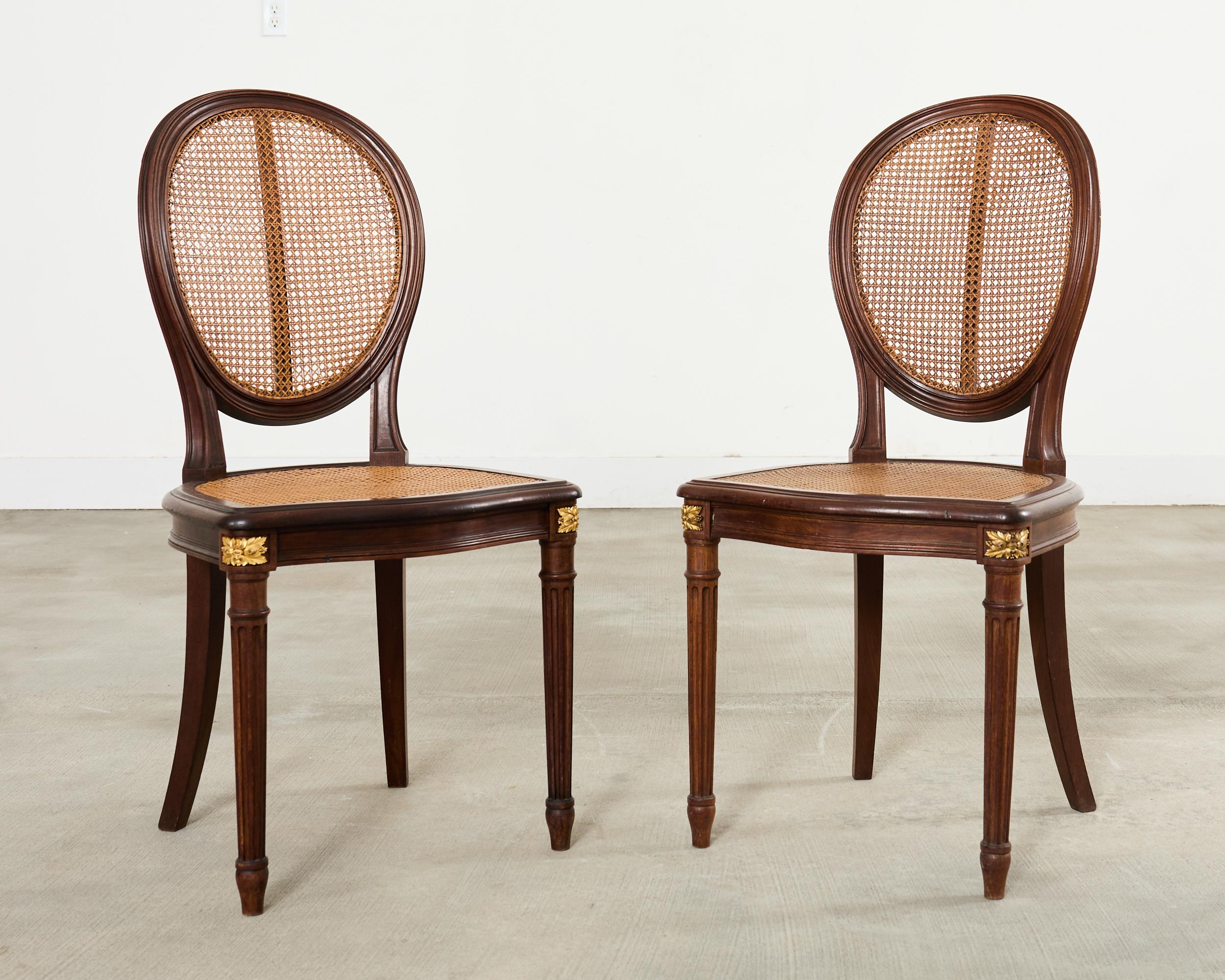 Set of Eight Louis XVI Style Bronze Ormolu Caned Dining Chairs en vente 1