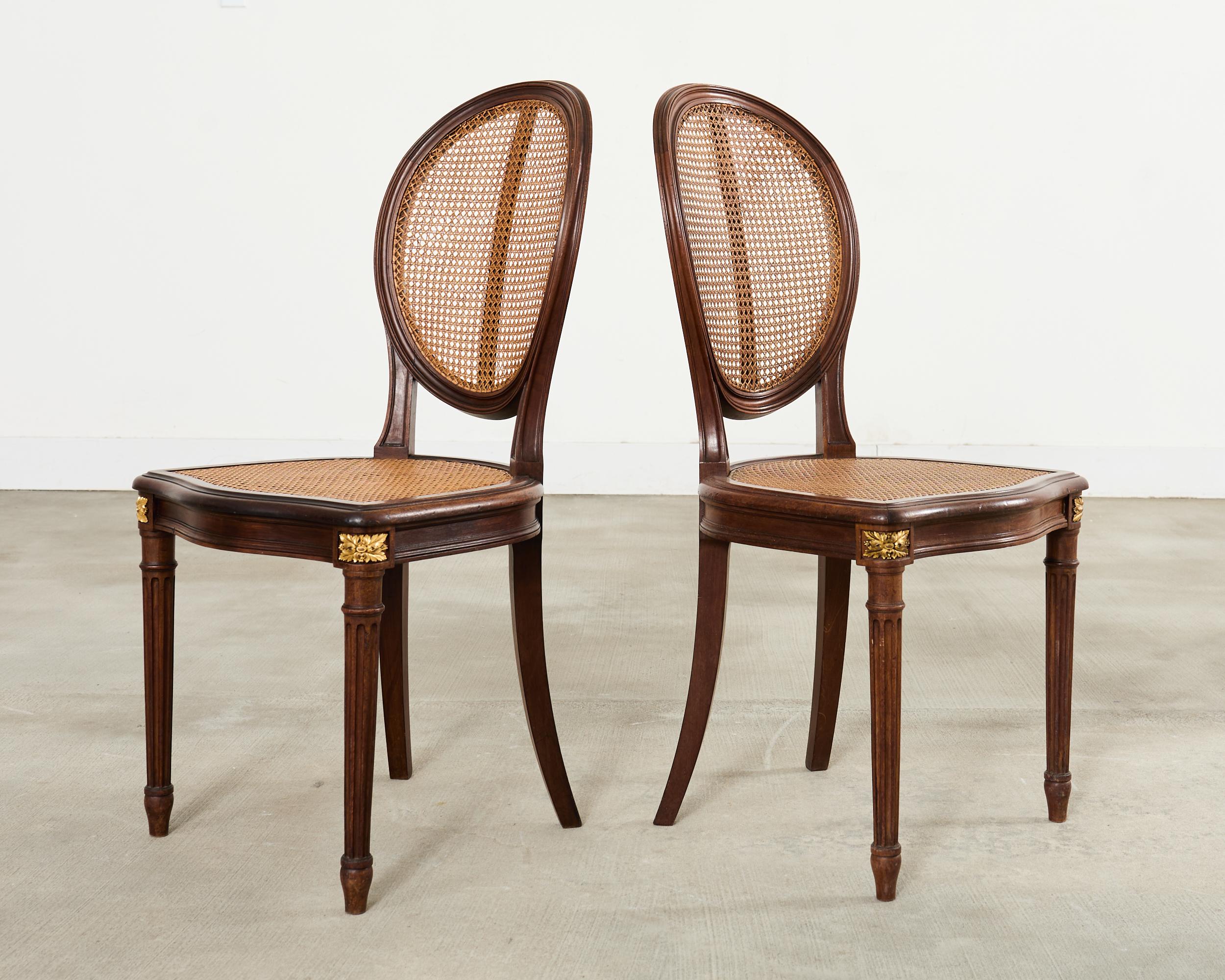 Set of Eight Louis XVI Style Bronze Ormolu Caned Dining Chairs en vente 2