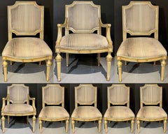Set of Eight Louis XVI Style Dining Chairs Painted and Parcel-Gilt, Jansen Style