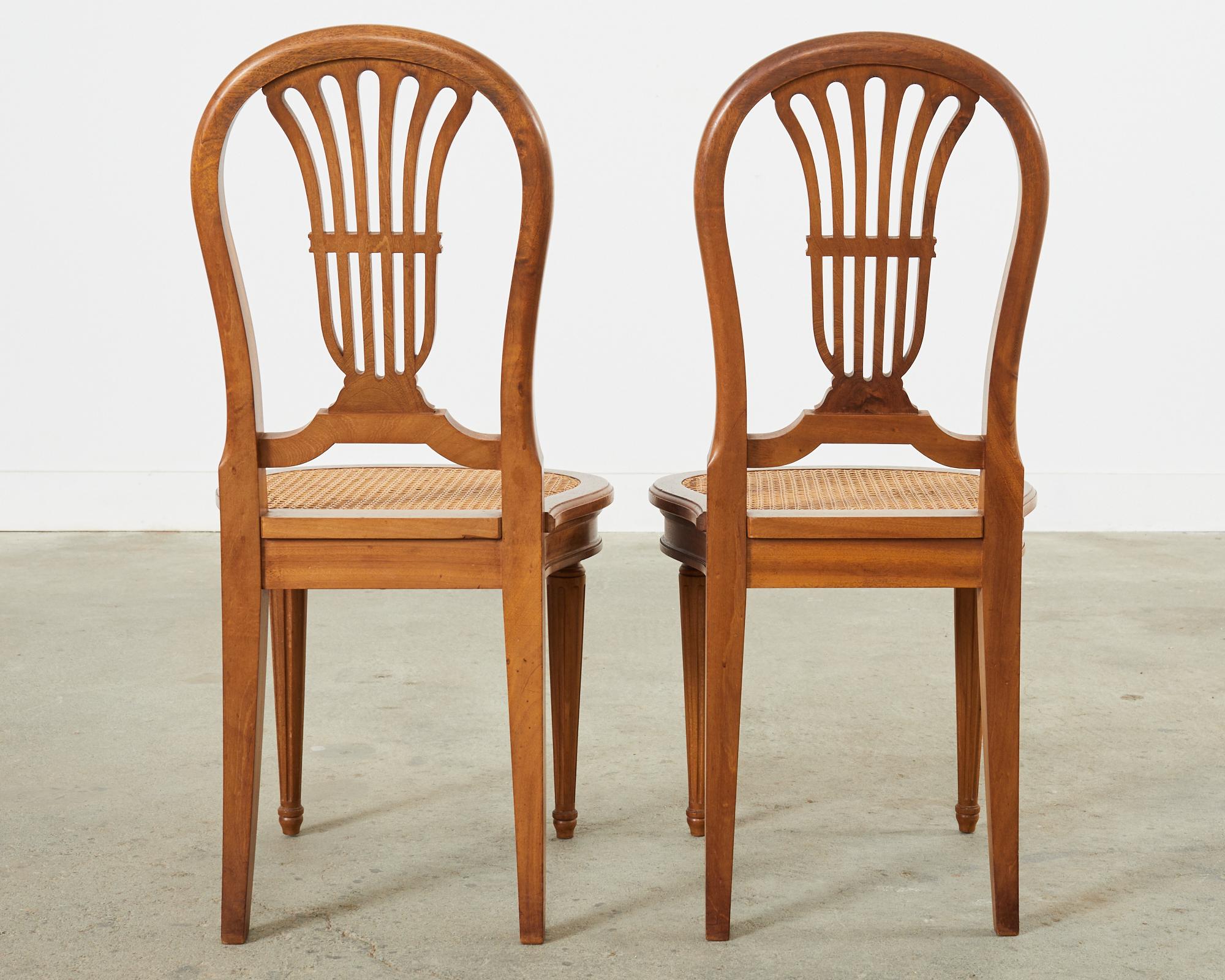 Set of Eight Louis XVI Style Walnut Cane Dining Chairs For Sale 4