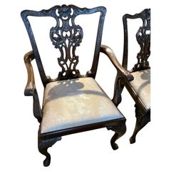 Set of Eight mahogany chippendale style carved dining chairs