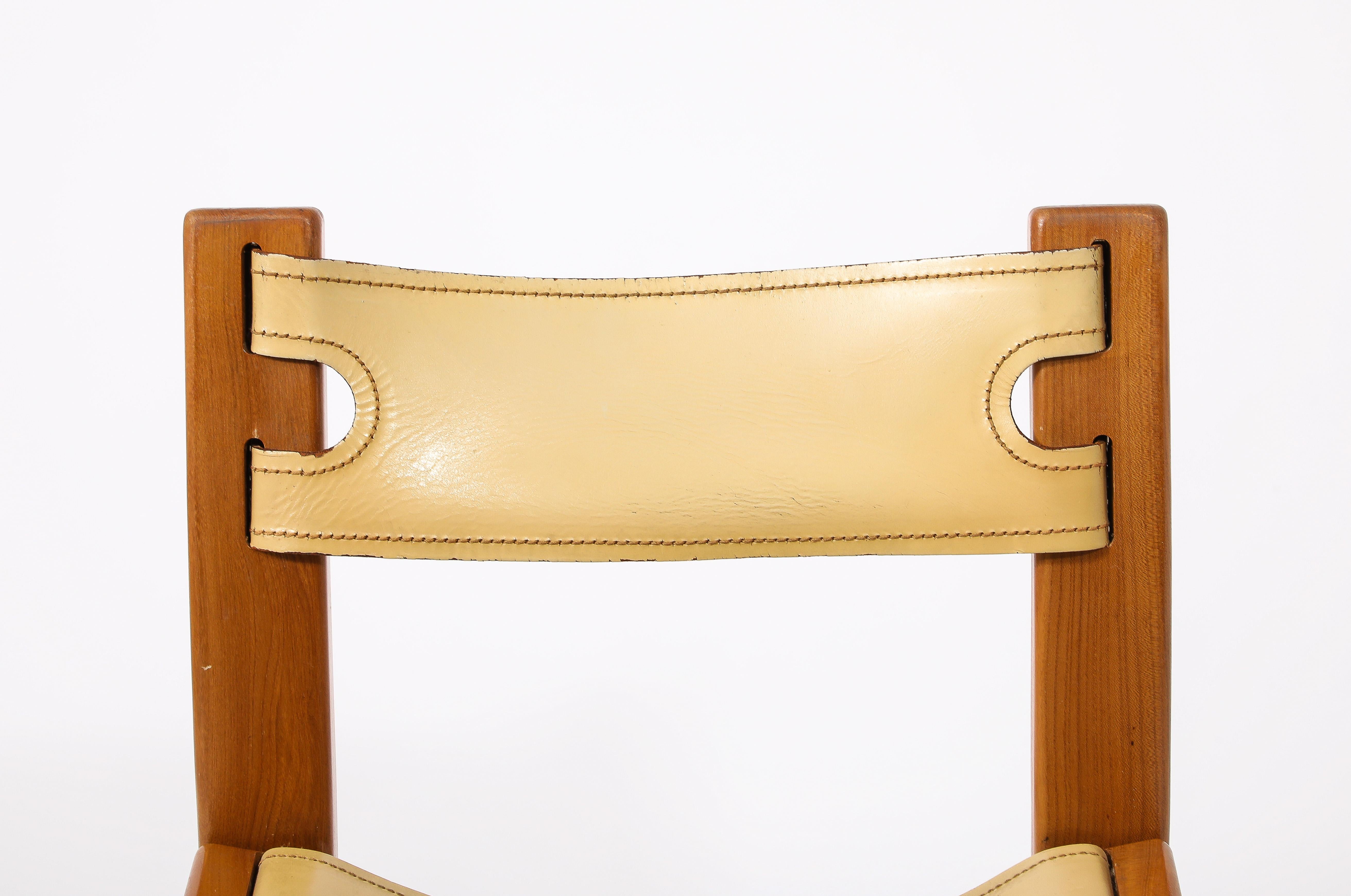 Set of 8 dining chairs by Regain with the less-seen ivory leather slings. All original finish and leather.
