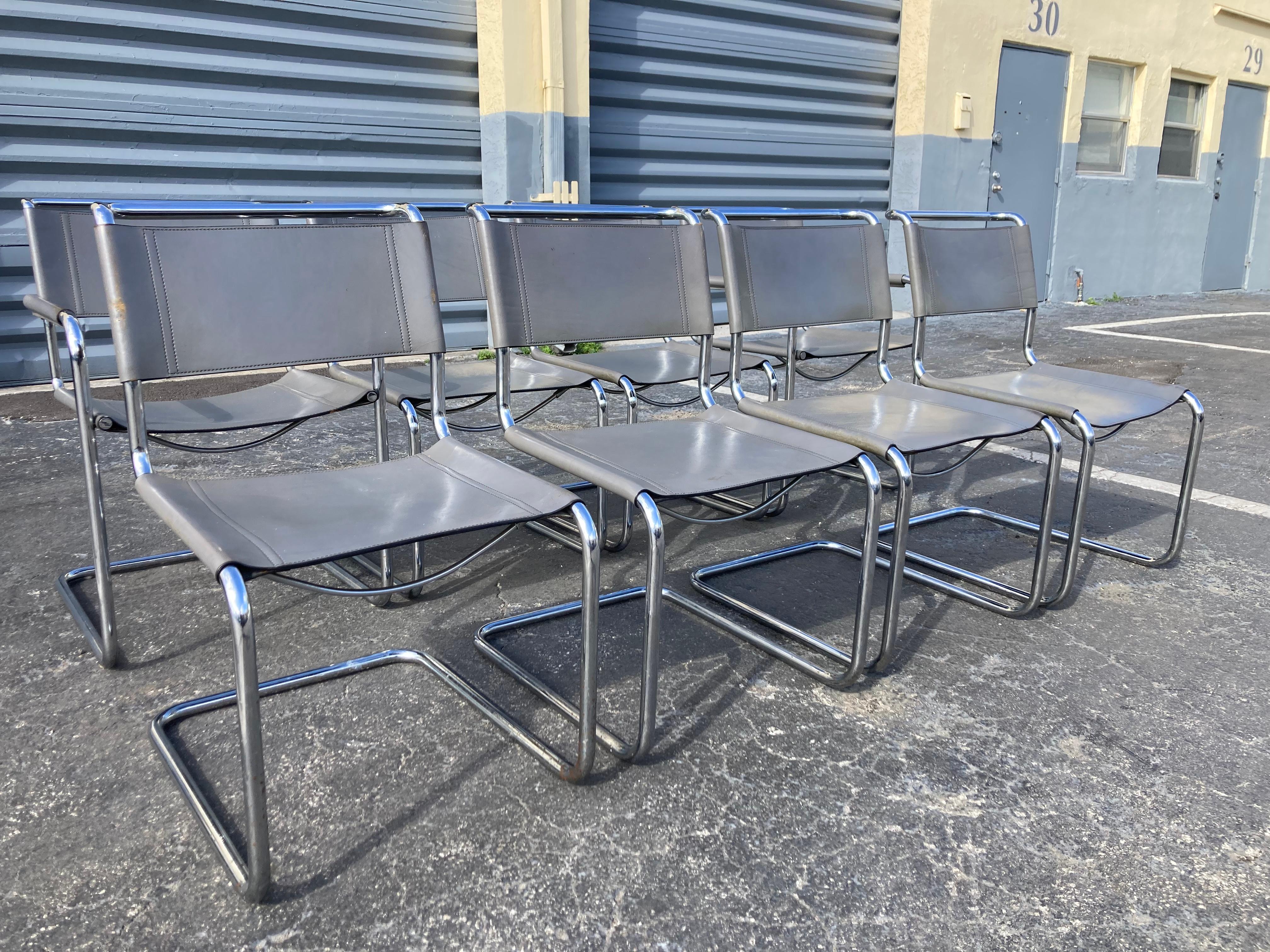 Set of Eight Mart Stam Gray Leather Chairs for Fasem, sold by Stendig. Two arm and six side chairs. Made in Italy 1980s. Arm chairs are 22.75” wide.