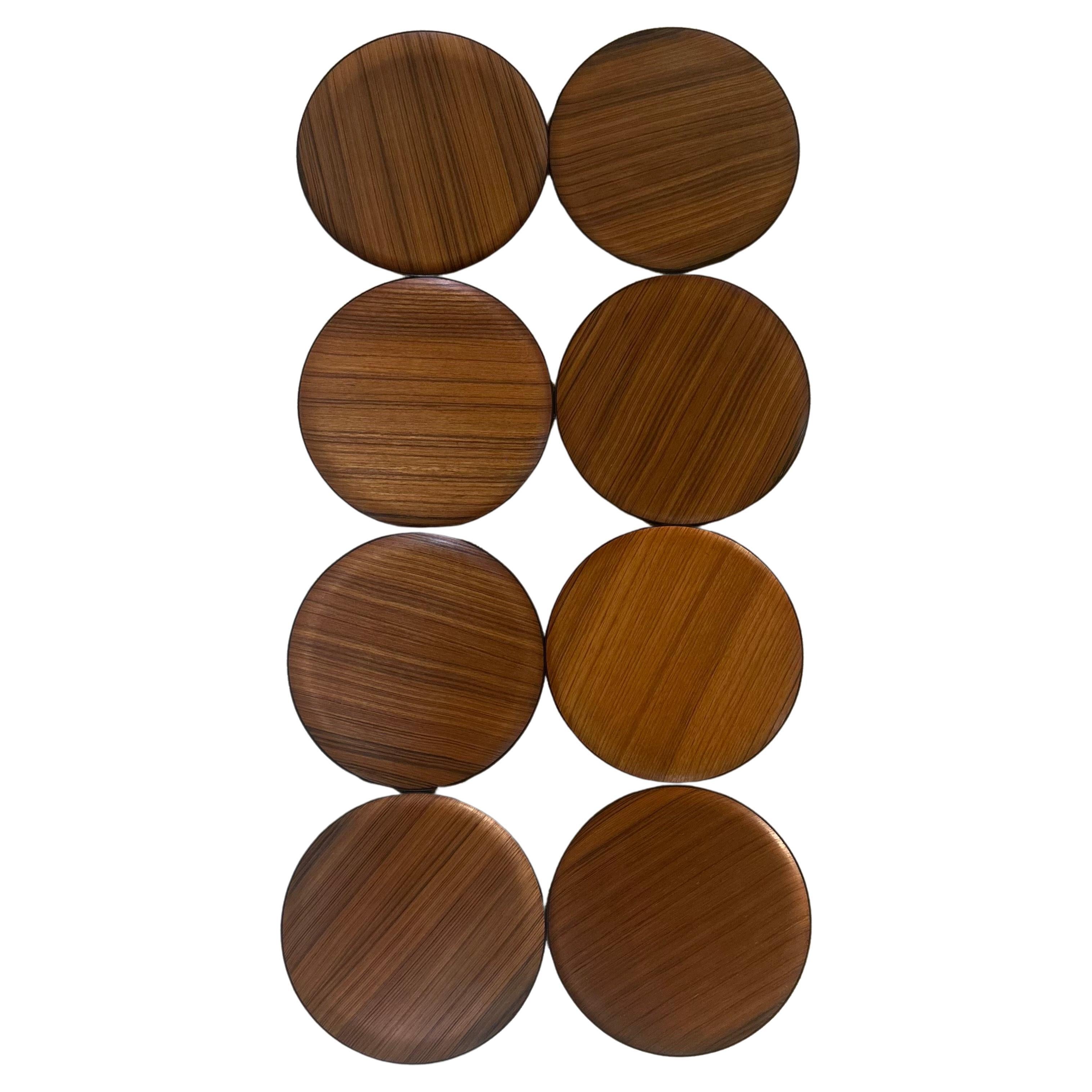 A nice set of eight MCM Japanese teak plates / chargers by Otagari Mercantile Co. (OMC), circa 1960s. The plates are in very good vintage condition and measure 12