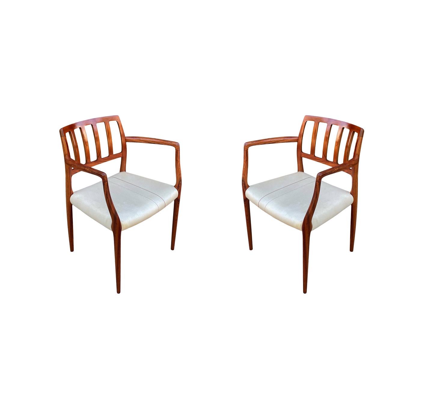 Set of Eight Mid Century Danish Modern Dining Chairs in Rosewood by Niels Moller For Sale 10