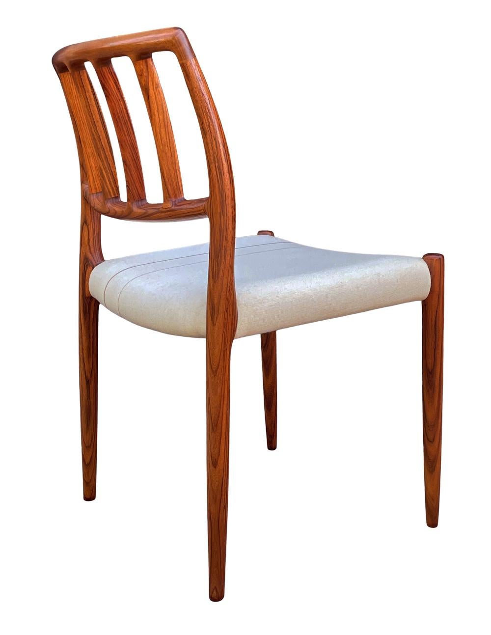 Fabric Set of Eight Mid Century Danish Modern Dining Chairs in Rosewood by Niels Moller For Sale