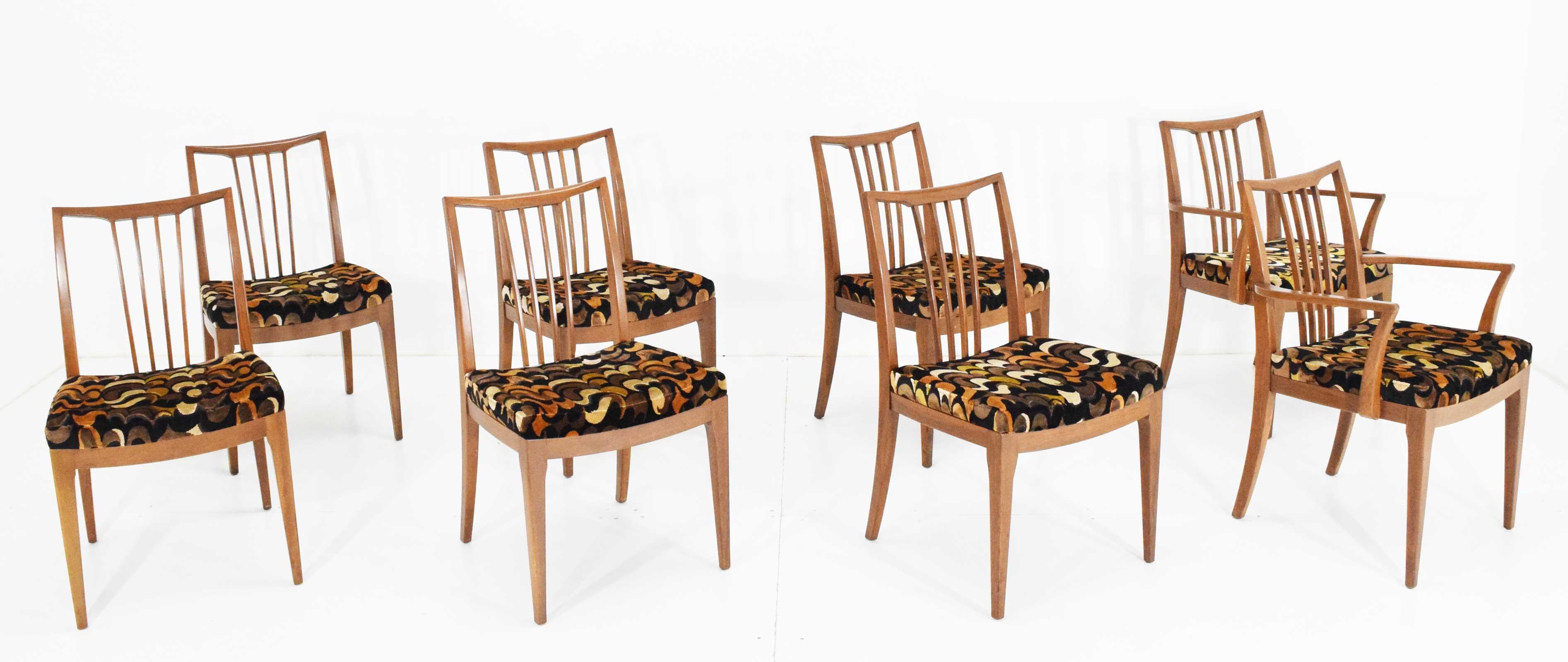 Beautiful set of midcentury dining chairs in a Jack Lenor Larsen velvet. Chairs are walnut and we believe attributed to George Nakashima for Widdicomb. 

Measurements of armchairs are 32.25