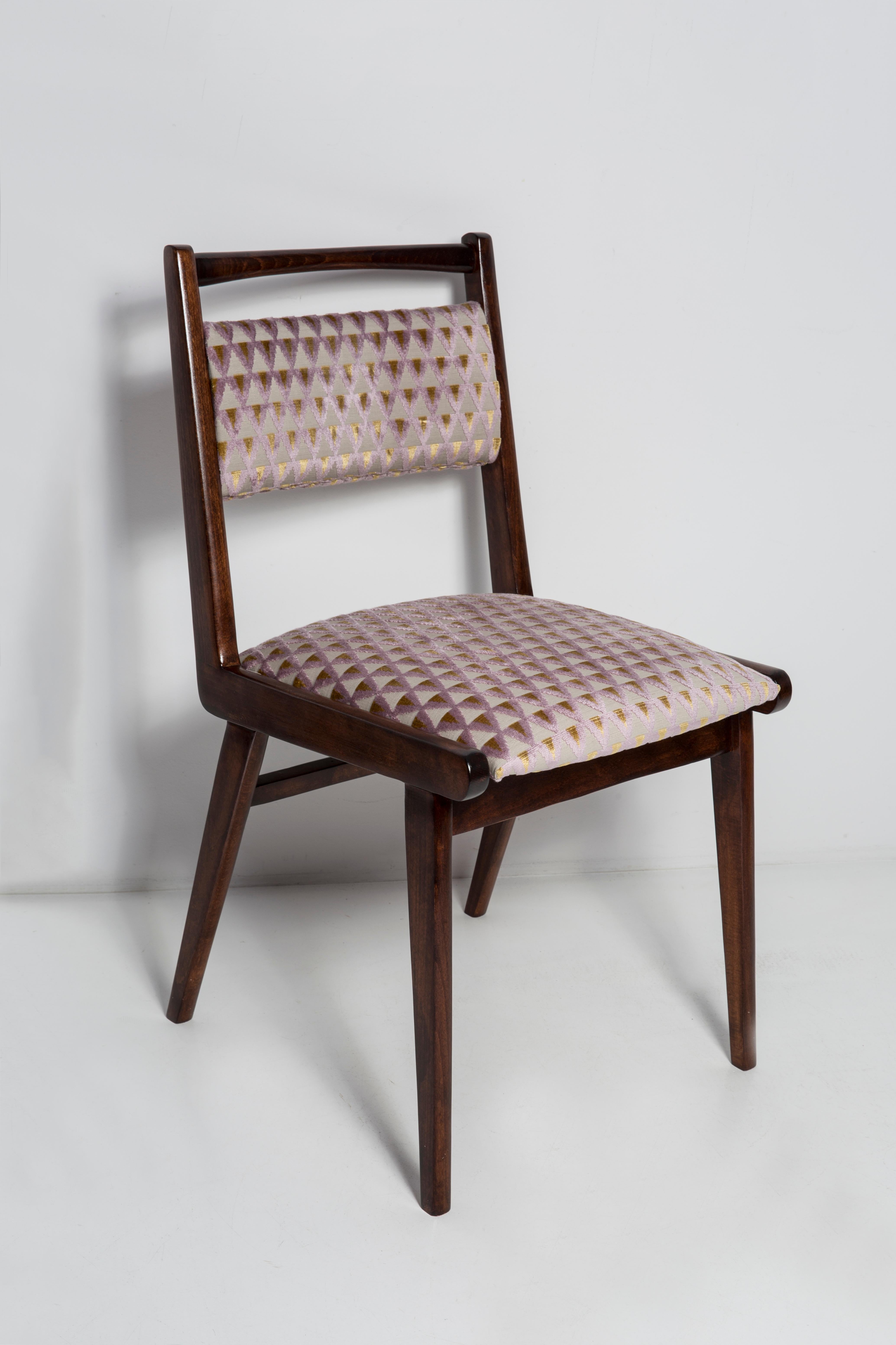 Chairs designed in 1960s by Prof. Rajmund Halas. It is jar type model. 
Made of beechwood. Chairs are after a complete upholstery renovation, the woodwork has been refreshed. Seat and back is dressed in a light purple, durable and pleasant to the
