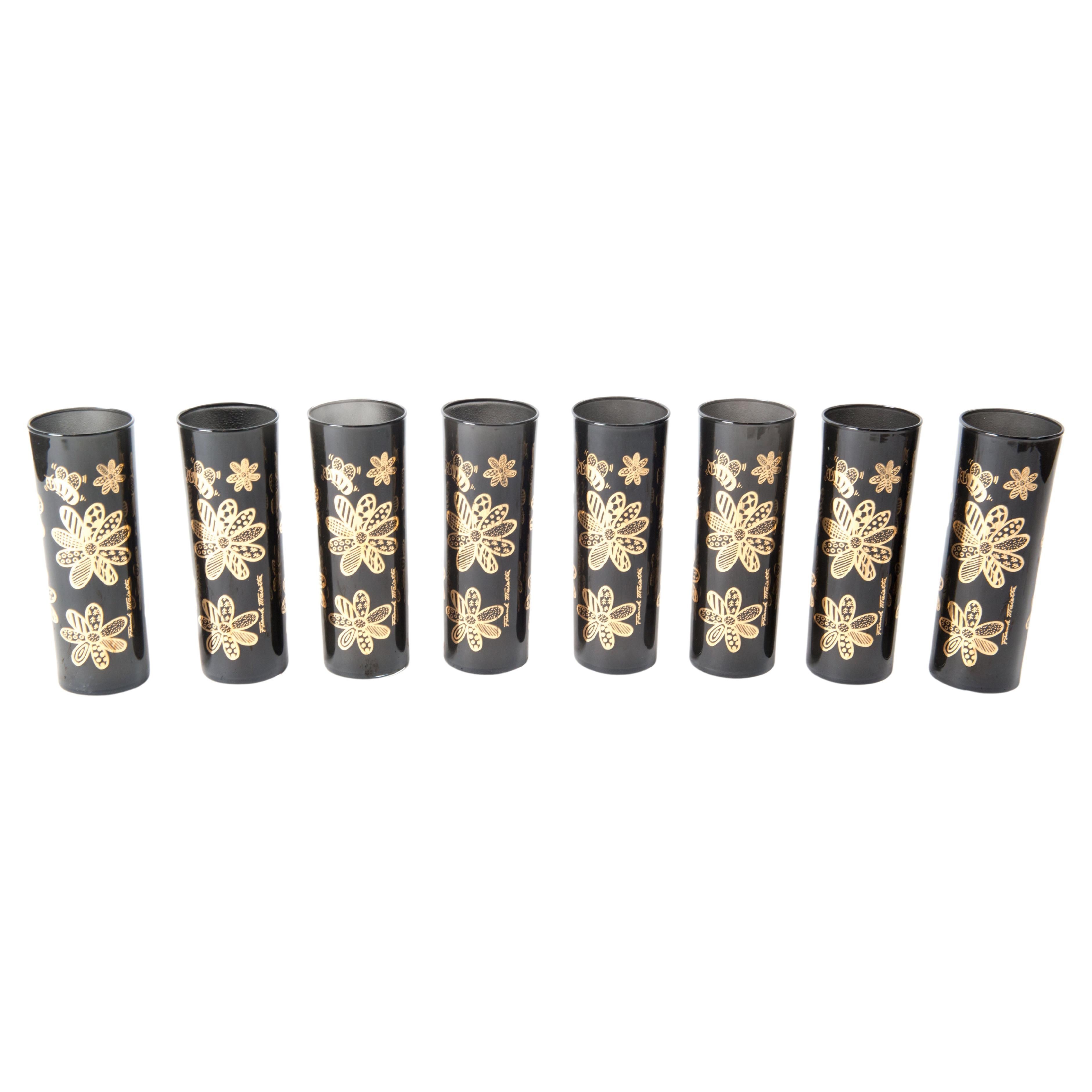 Set von acht Mid-Century Modern Gläsern in Schwarz und Gold mit Gänseblümchenmotiven im Angebot