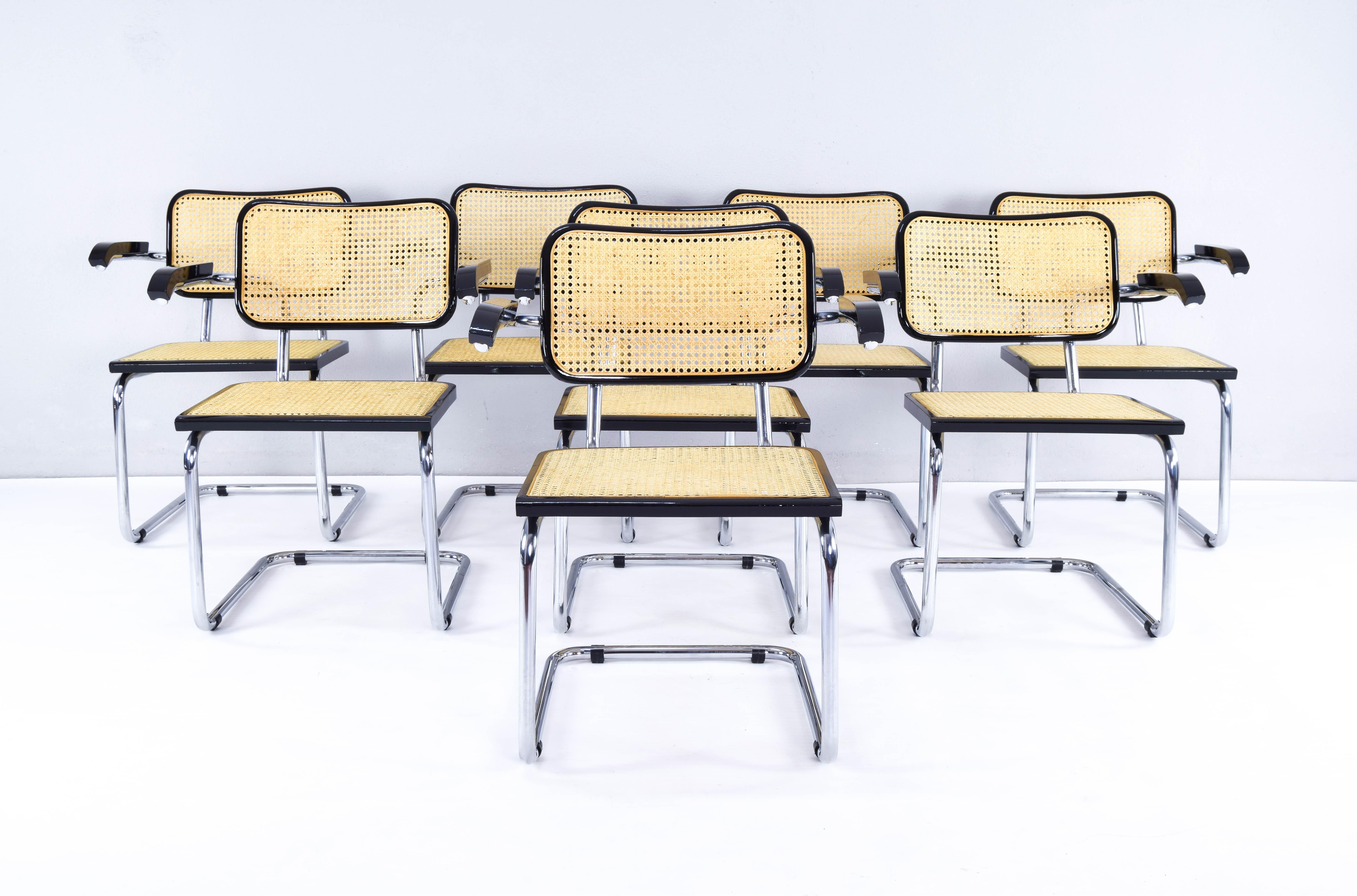 Set of eight Cesca chairs, model B64, made in Italy in the 1970s. Chromed tubular steel structure, black lacquered beech wood frames and Viennese natural grid. 
Very good vintage condition.

Measures: Total height 80 cm
Seat height 44 cm
Armrest