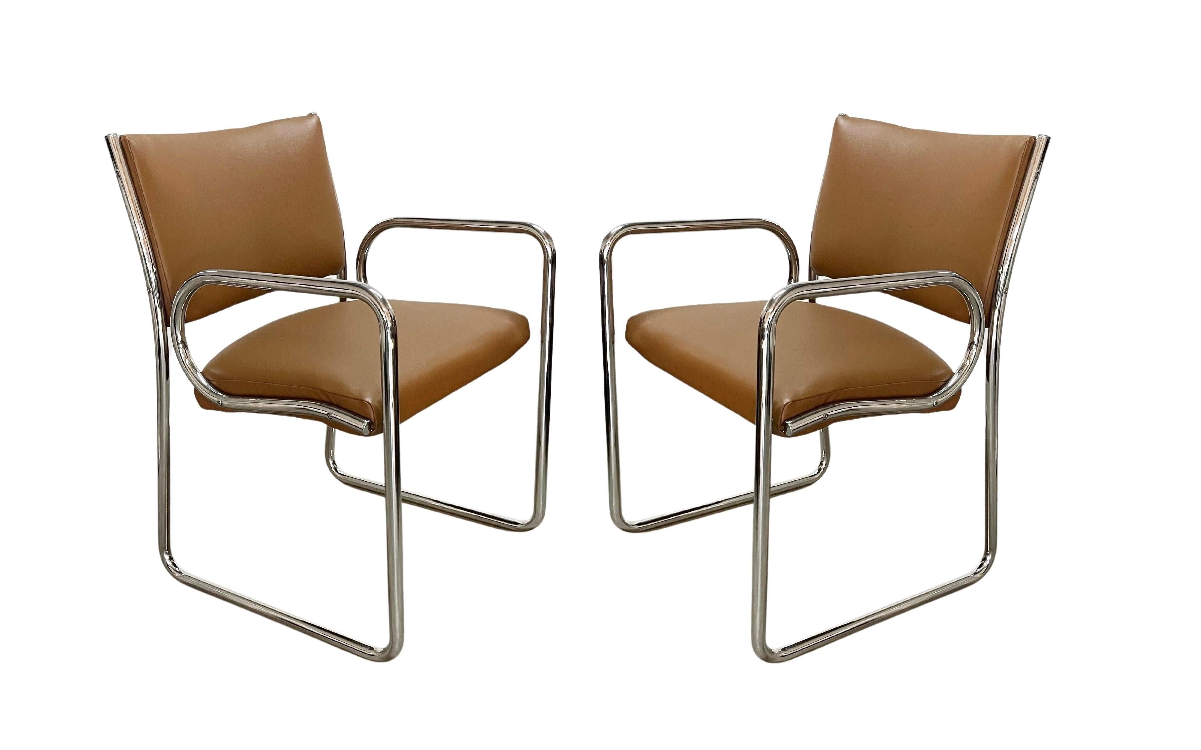 This striking set of eight Tubular dining chairs designed by Charles Gibilterra for Vecta Contract Inc. The sleek lines of the chairs combine perfectly with the curves of the cantilever to create a classic vintage silhouette. It is comprised of a