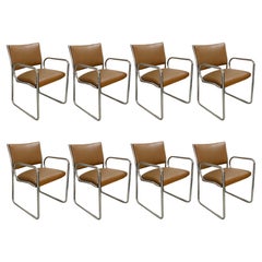 Huit chaises de salle à manger tubulaires de style mi-siècle moderne conçues par Charles Gibilterra