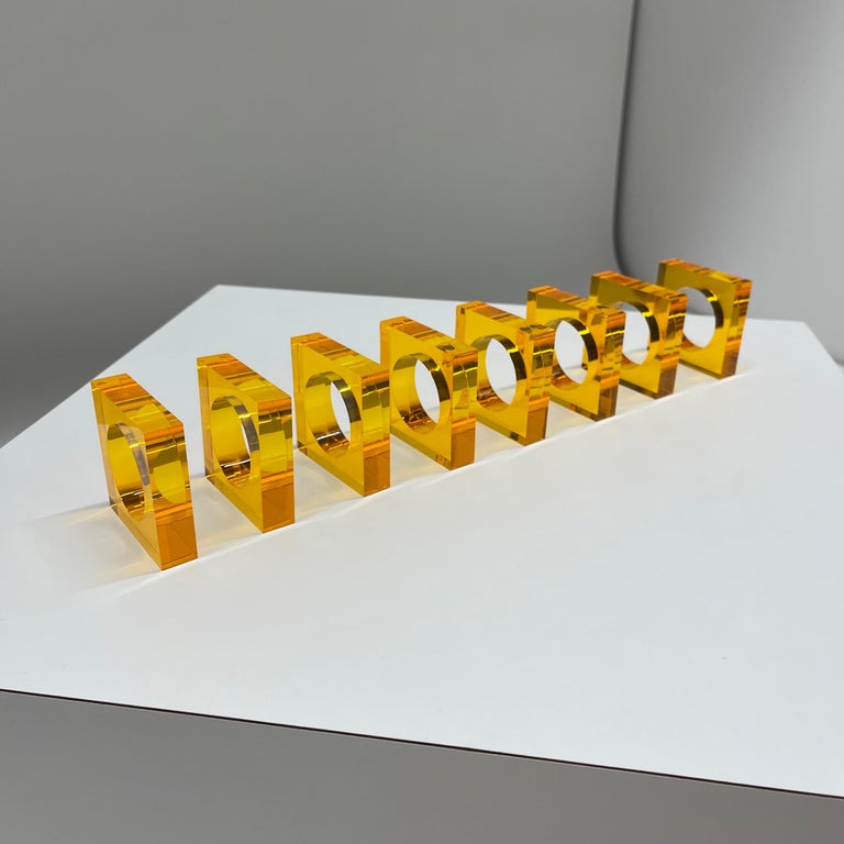 Set of Eight Mid-Century Orange Lucite Napkin Rings or Holders