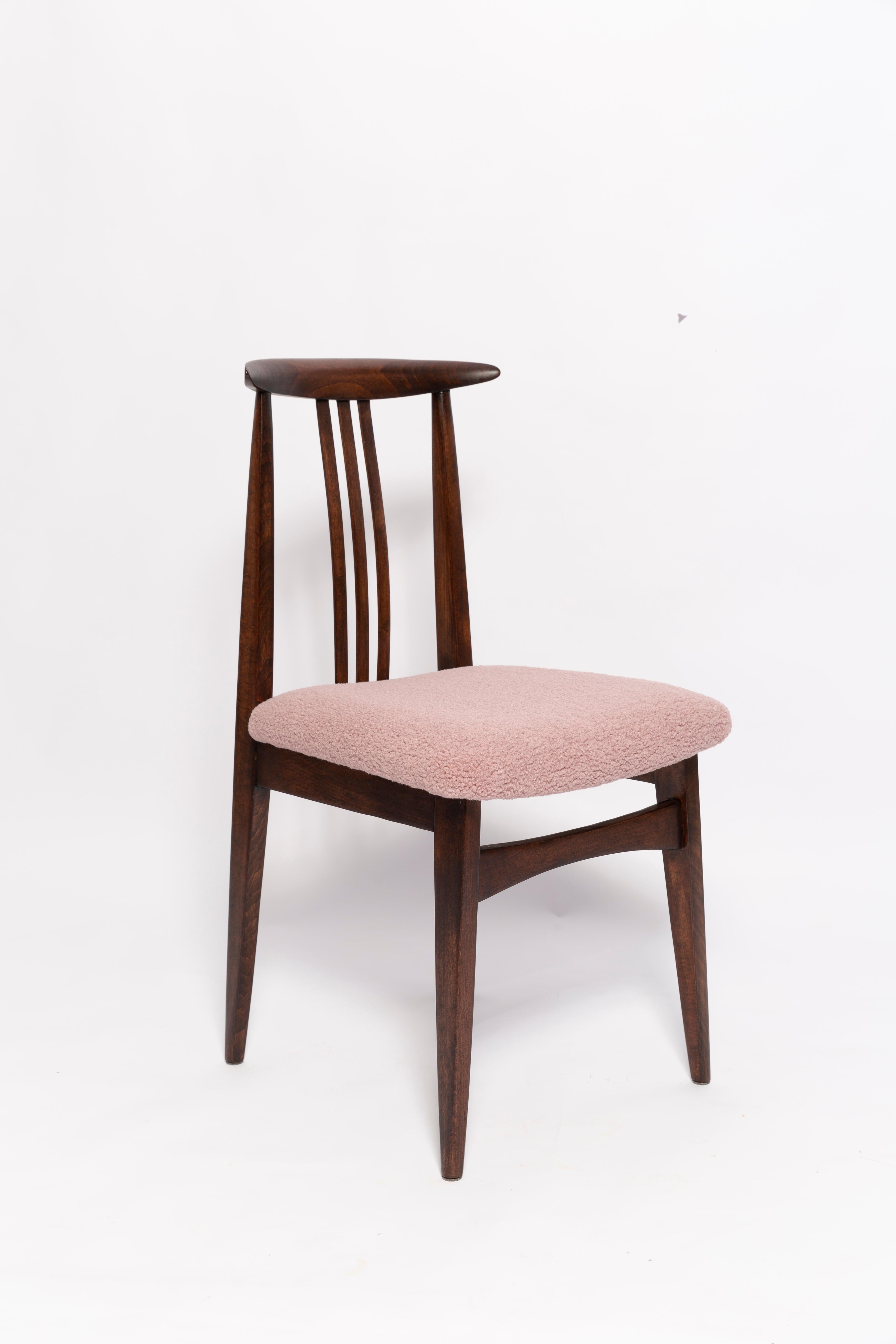 A beautiful beech chair designed by M. Zielinski, type 200 / 100B. Manufactured by the Opole Furniture Industry Center at the end of the 1960s in Poland. The chair is after undergone a complete carpentry and upholstery renovation. Seats covered with