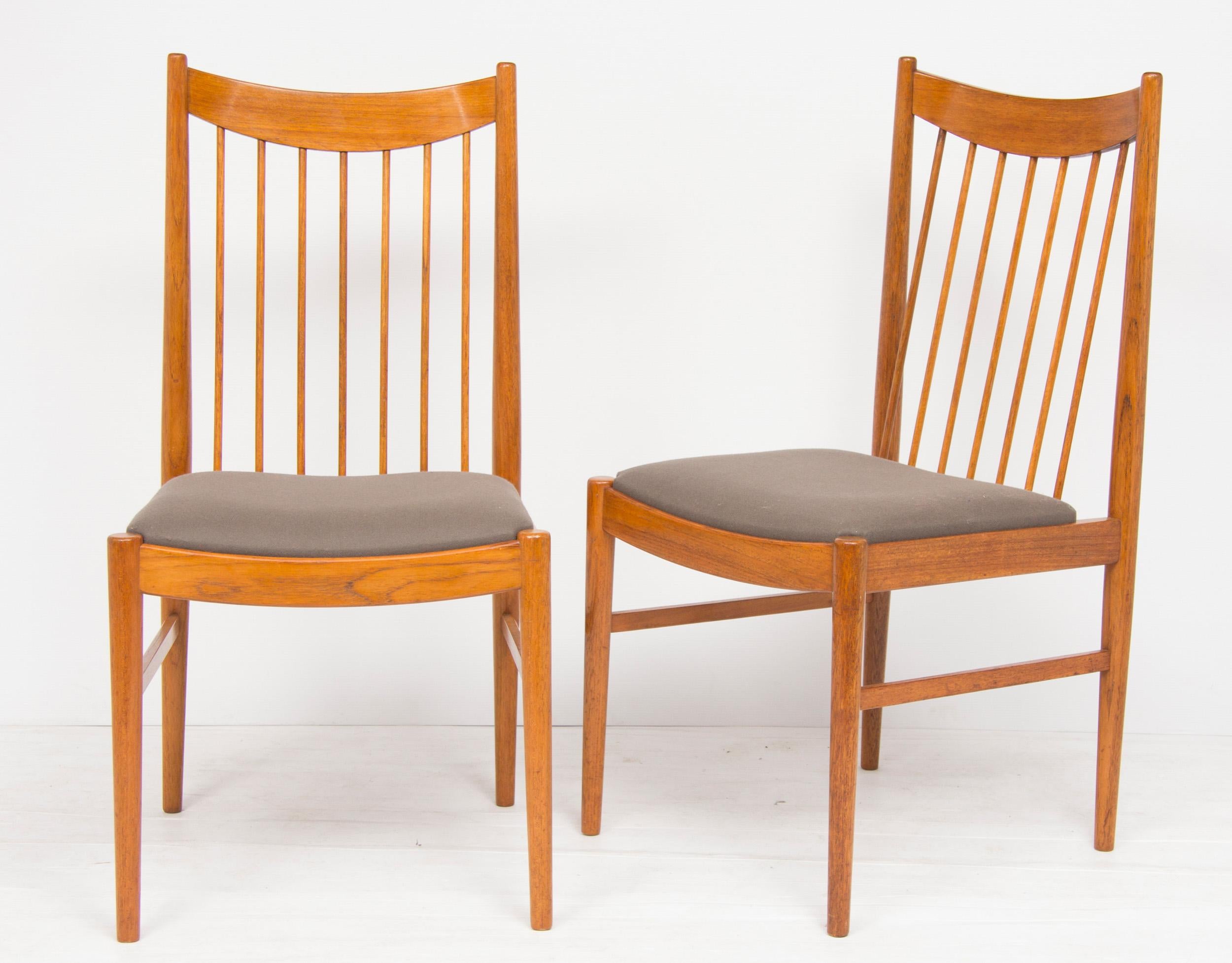 Set of eight midcentury teak dining chairs by Arne Vodder for Sibast. Newly upholstered.