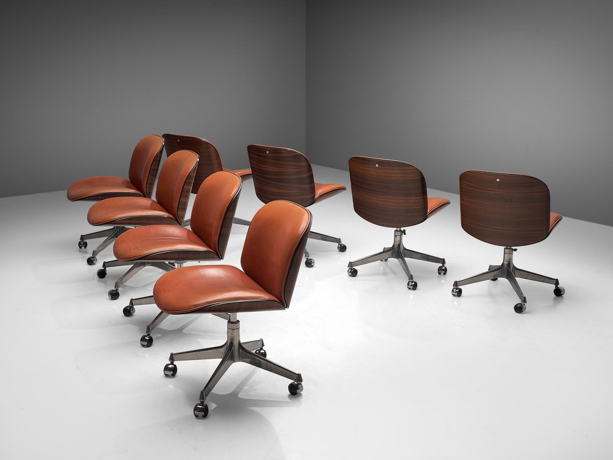 Mid-Century Modern Set of Eight MIM Swivel Chairs in Rosewood and Coral Leather