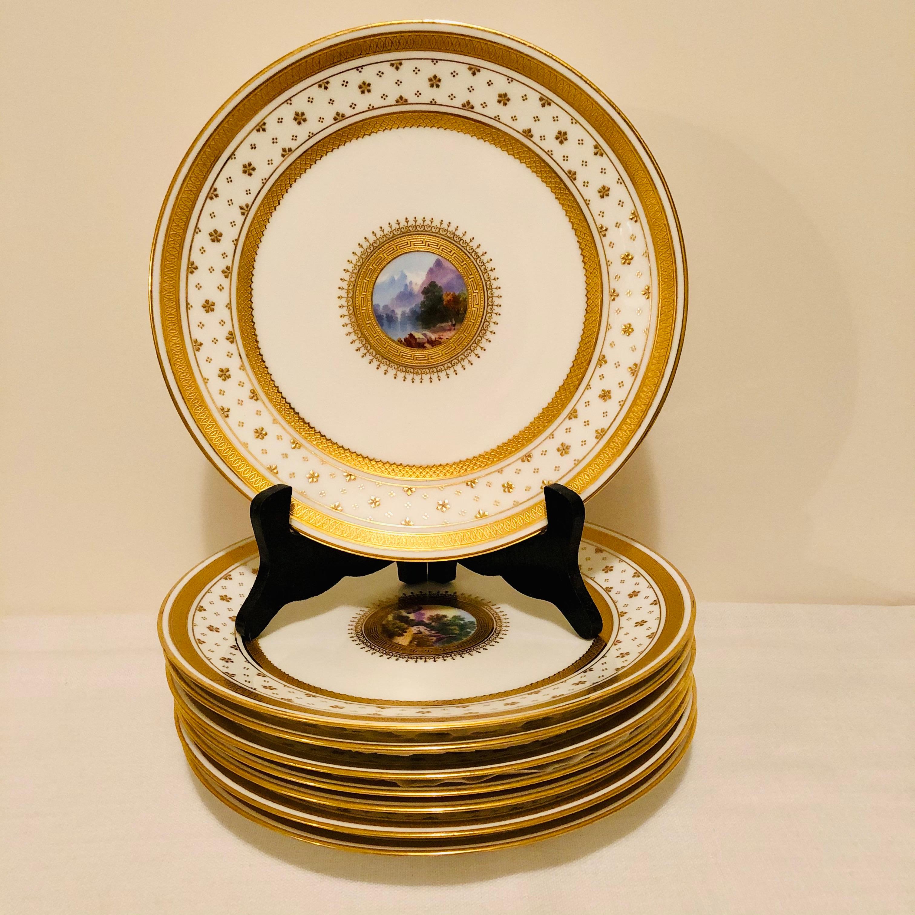 Look at the gorgeous hand painted scenes on this set of English Minton luncheon or dessert plates. The miniature paintings of the wonderful landscapes are painted by an extremely talented artist. The edges of the plates are embellished with small