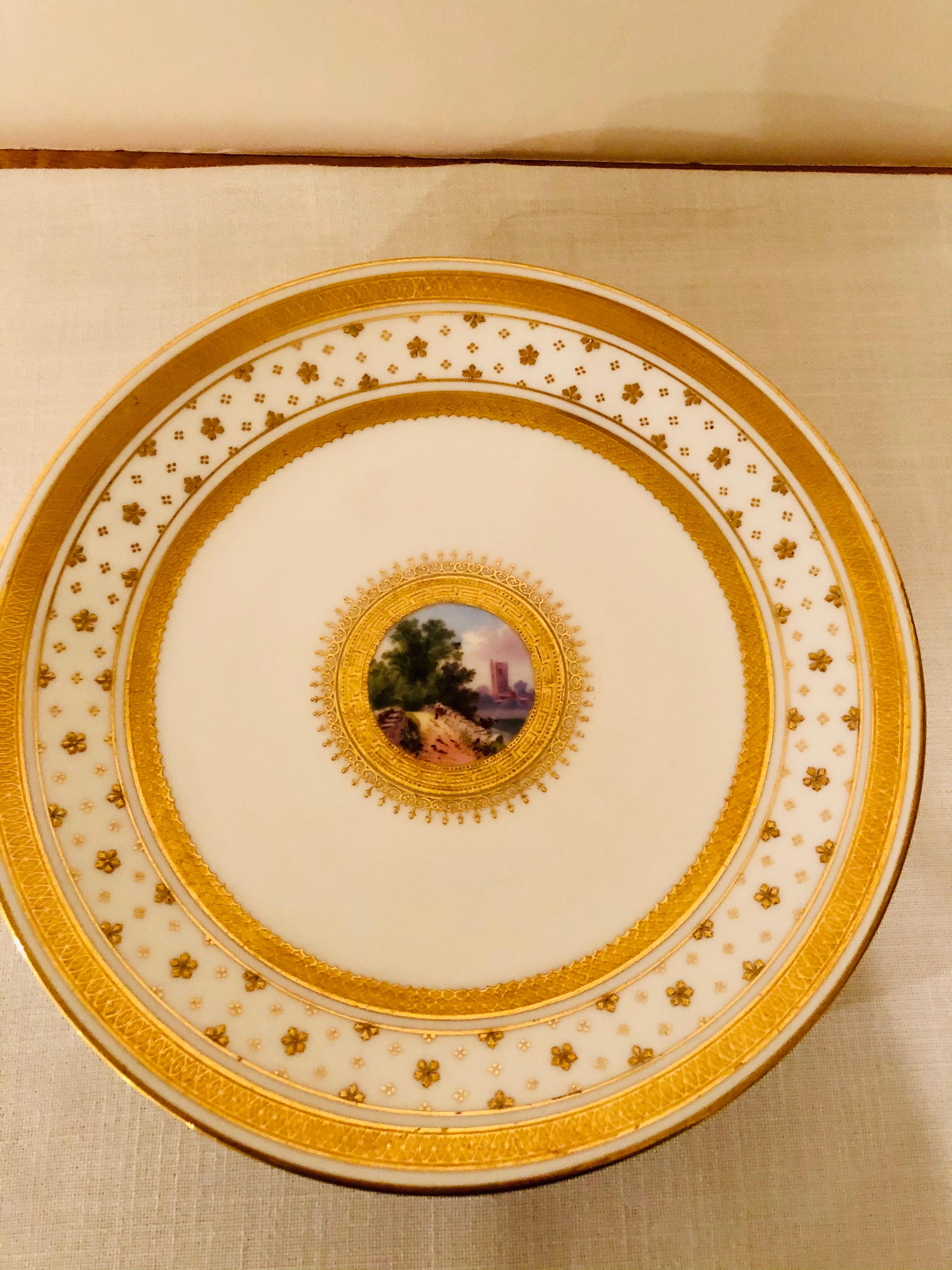Set of Eight Minton Plates Each Beautifully Hand Painted With a Different Scene In Good Condition For Sale In Boston, MA