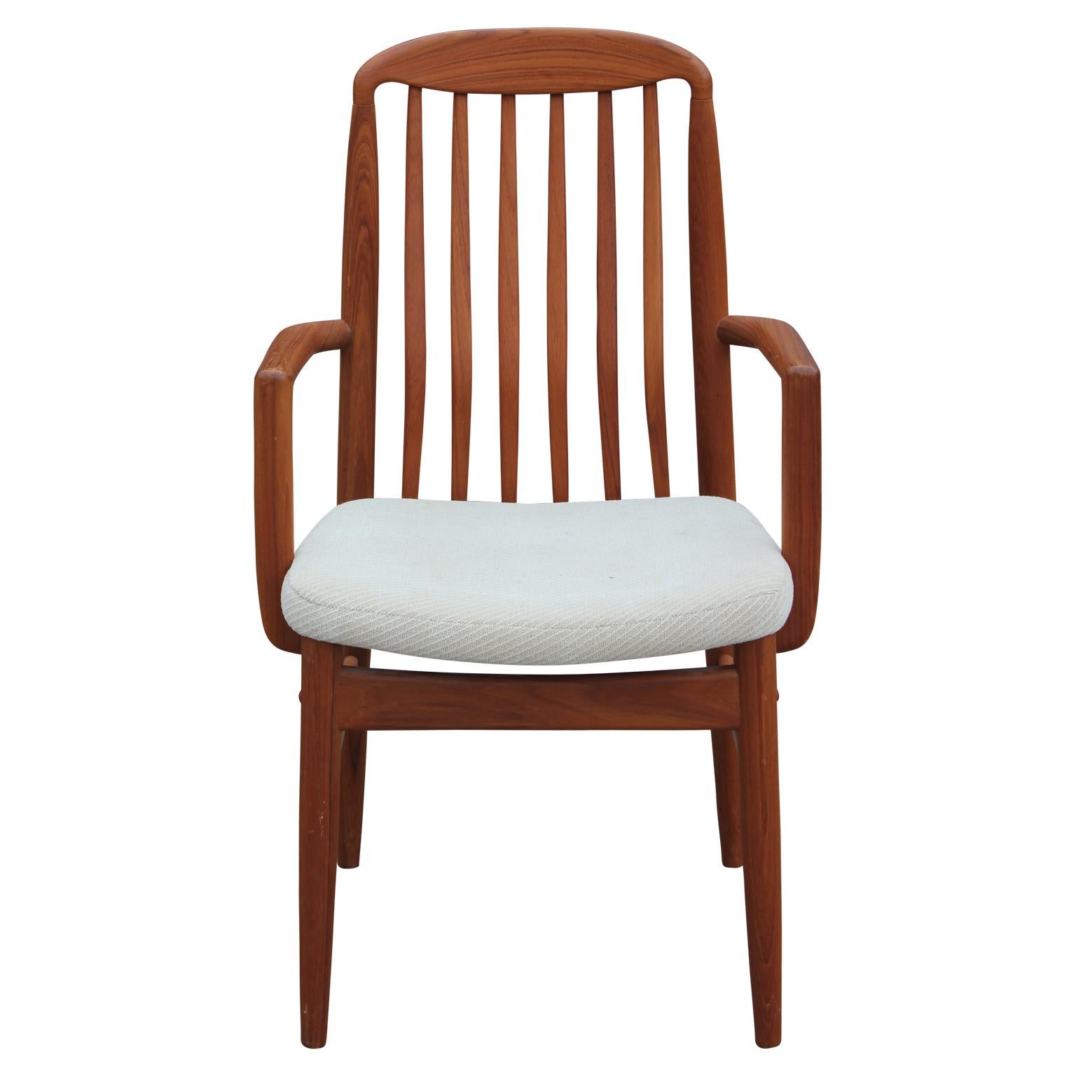 Lovely set of eight modern Danish solid teak dining chairs by Benny Linden. This set features two armchairs and six without arms. 

Dimensions of chairs with arms: 21.5 W x 37 in. H x 19.5 in. D x 18 in. SH.