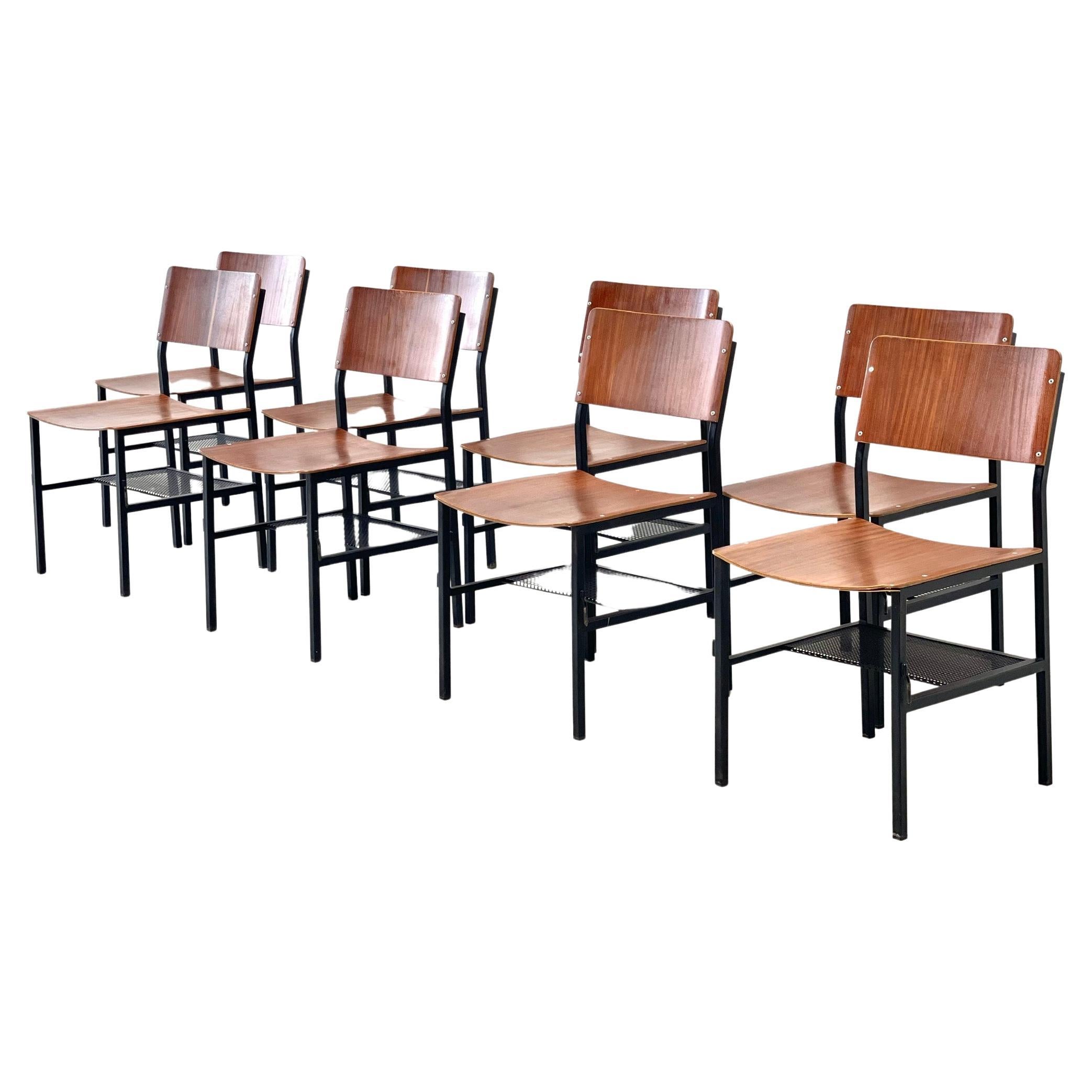 Set of eight modernist dining chairs For Sale