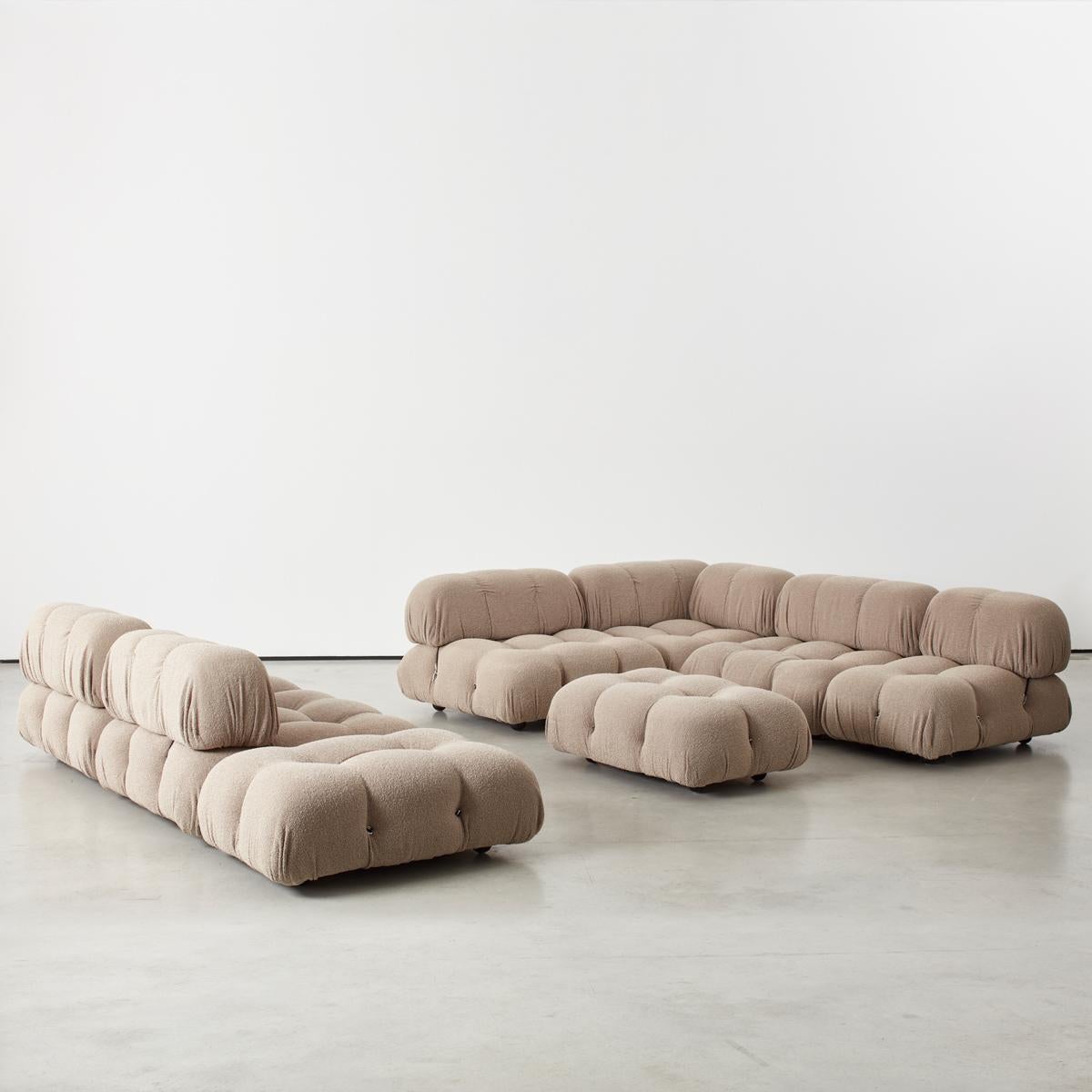 This modular sofa was designed by Mario Bellini in 1971 and was manufactured first by C&B and later by B&B Italia. The backs and armrests are provided with rings and carabineers, which allows the user to create the desired configuration best suited