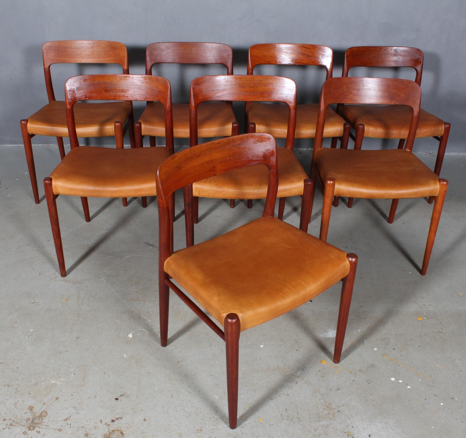 Set of eight N. O. Møller dining chairs with frame of solid teak.

Seats new upholstered with tan aniline leather

Model 75, made by J. L. Møller, Denmark, 1960s.