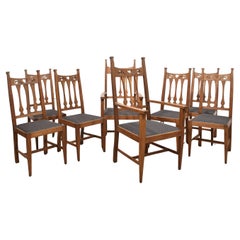 Set of eight oak Arts and Crafts dining chairs