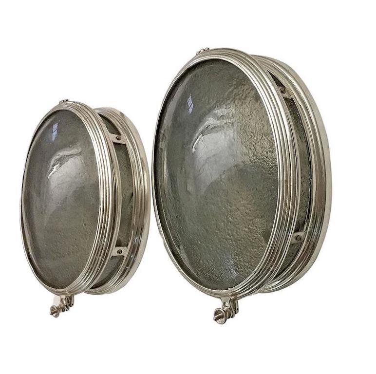 Set of eight French circa 1930's oval silver plated sconces with molded glass insets. Sold per pair.

Measurements:
Height 11.5