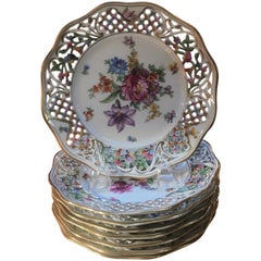 Set of Eight Porcelain Reticulated Luncheon Plates