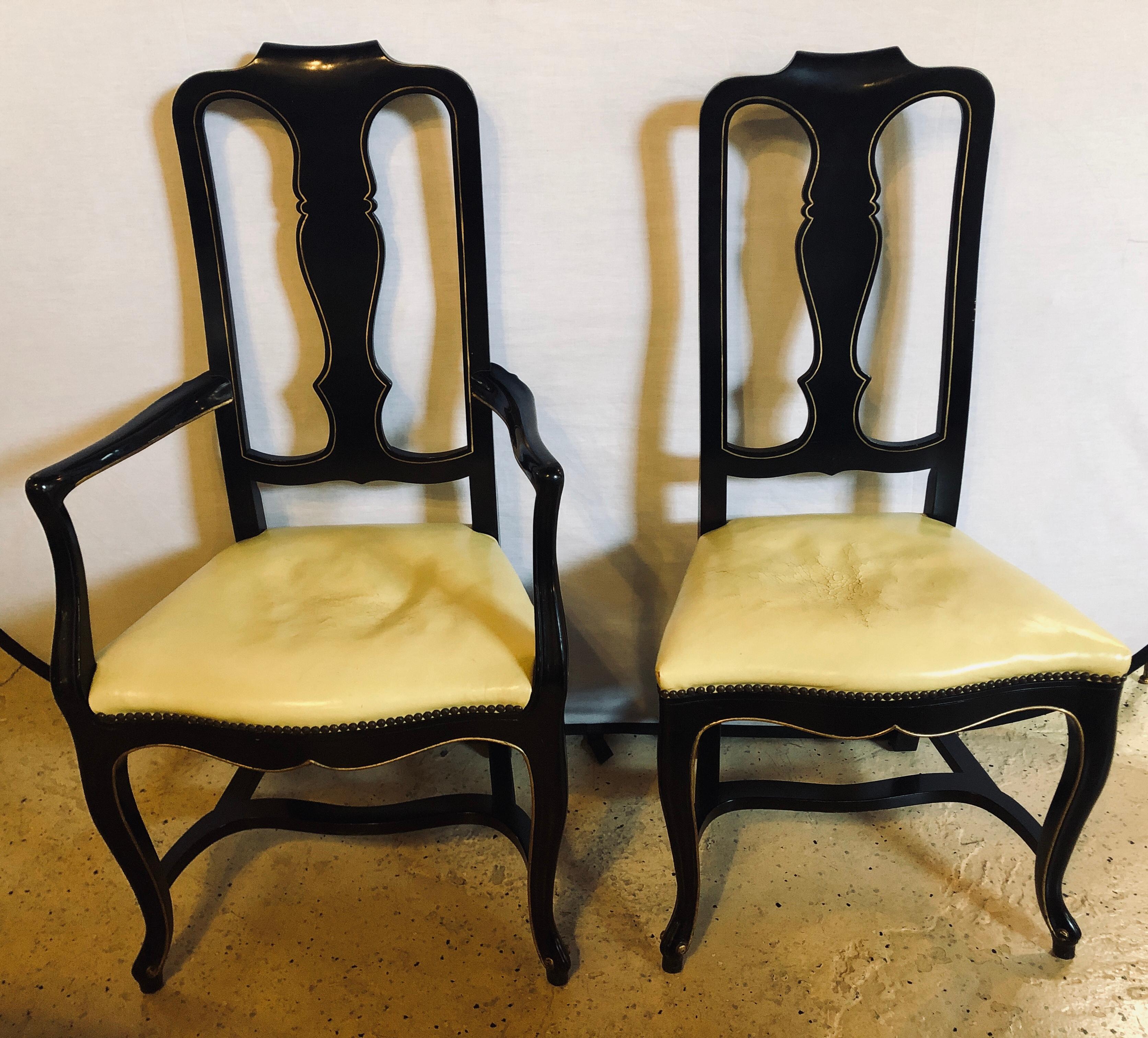 Set of eight Queen Anne style ebonized and gilt decorated dining chairs. These sleek and stylish dining chairs come straight from a NYC brownstone. The ebonized frames would fit easily in any Mid-Century Modern or Hollywood Regency setting.
$800
